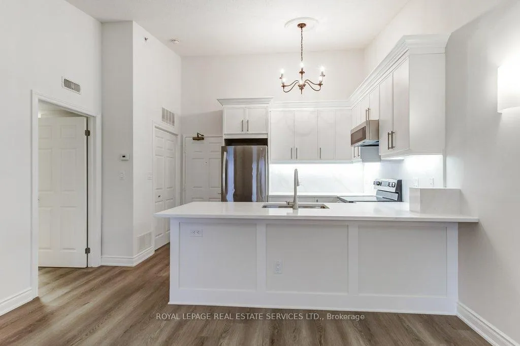 Photo 11 of Unit 409, 1483 Maple Avenue, Milton, Dempsey — HOMEH