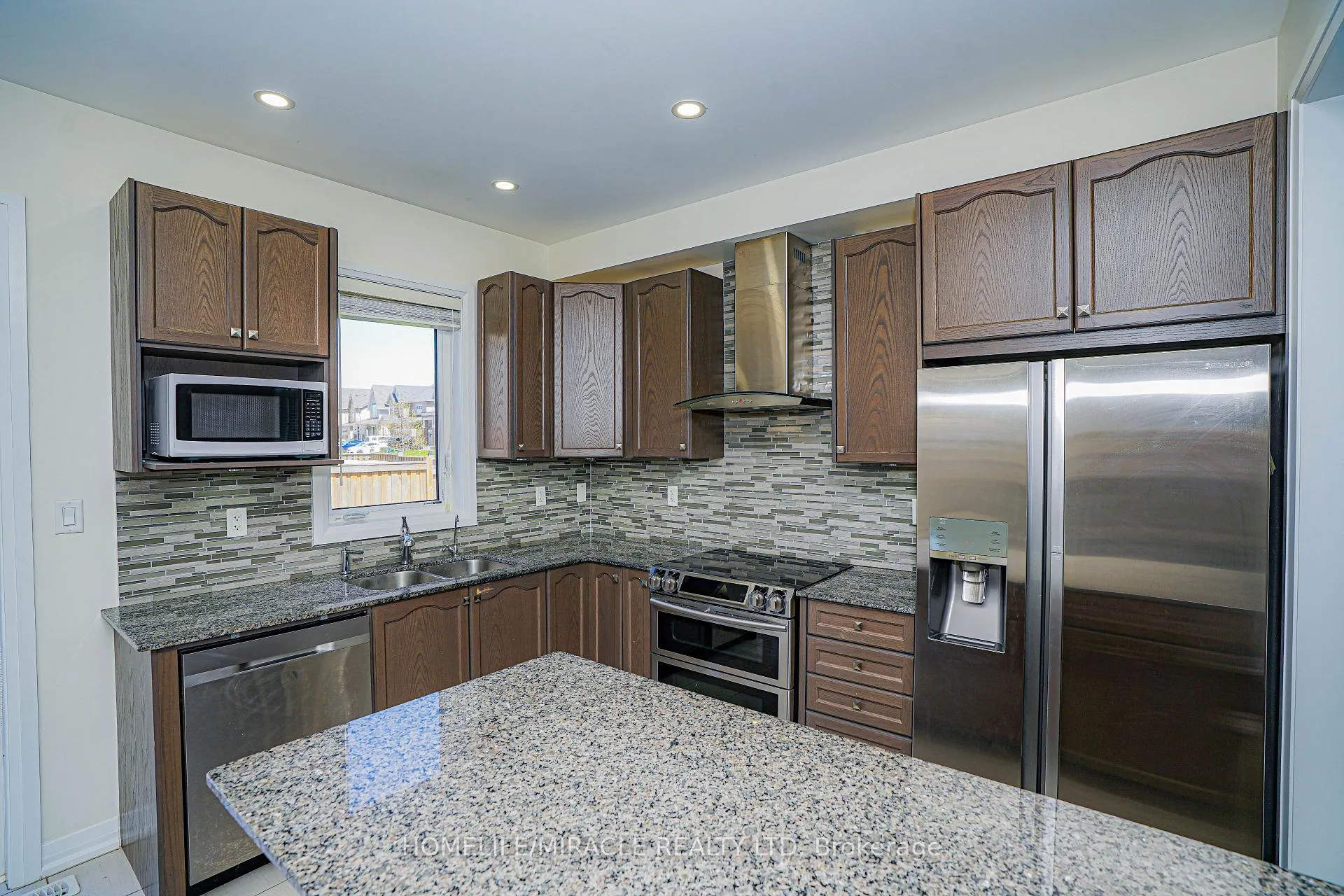 Photo 12 of 35 Drew Brown Boulevard, Orangeville — HOMEH