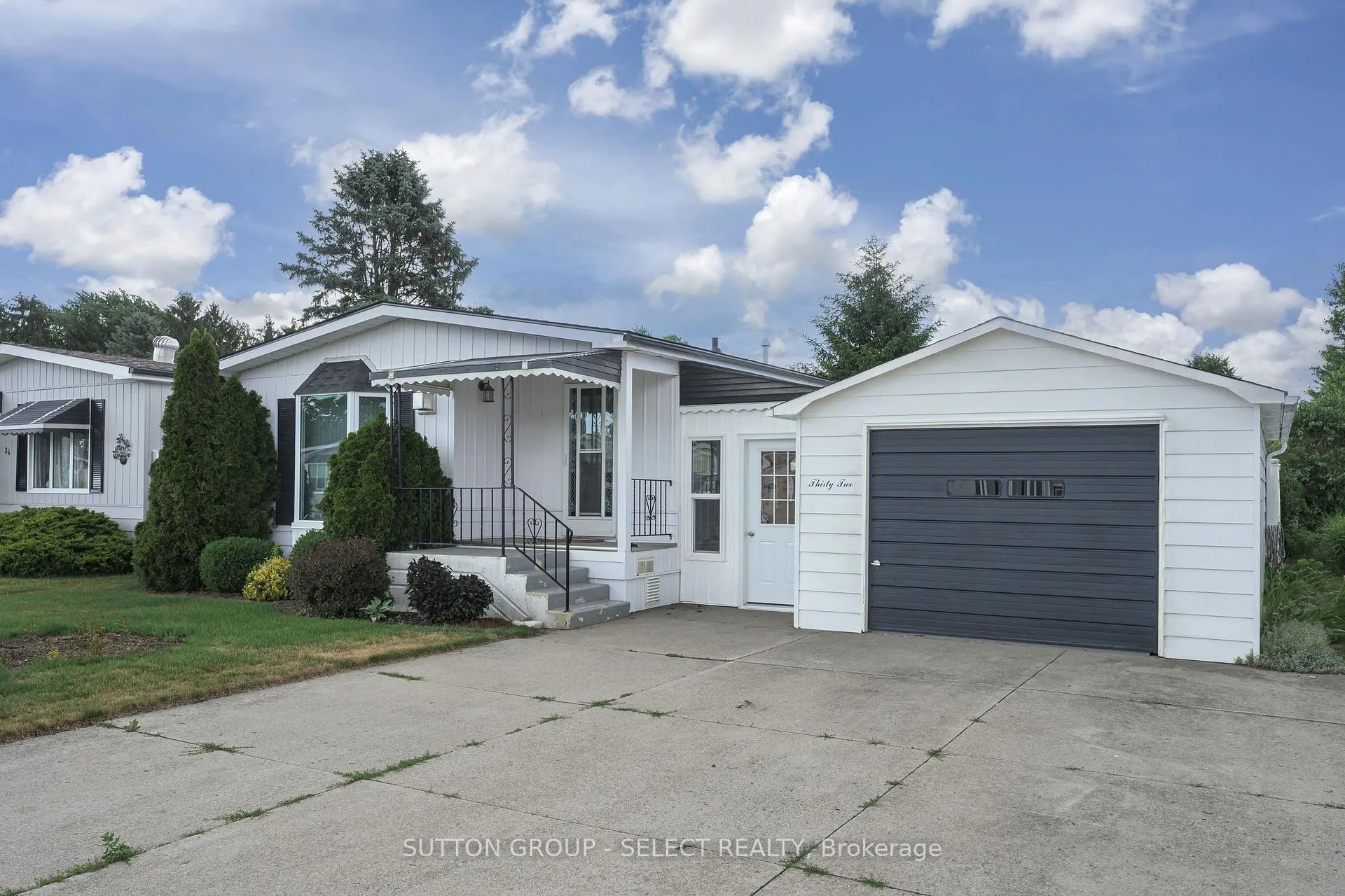 Photo 2 of 32 Miller Street, Strathroy-Caradoc, SE — HOMEH