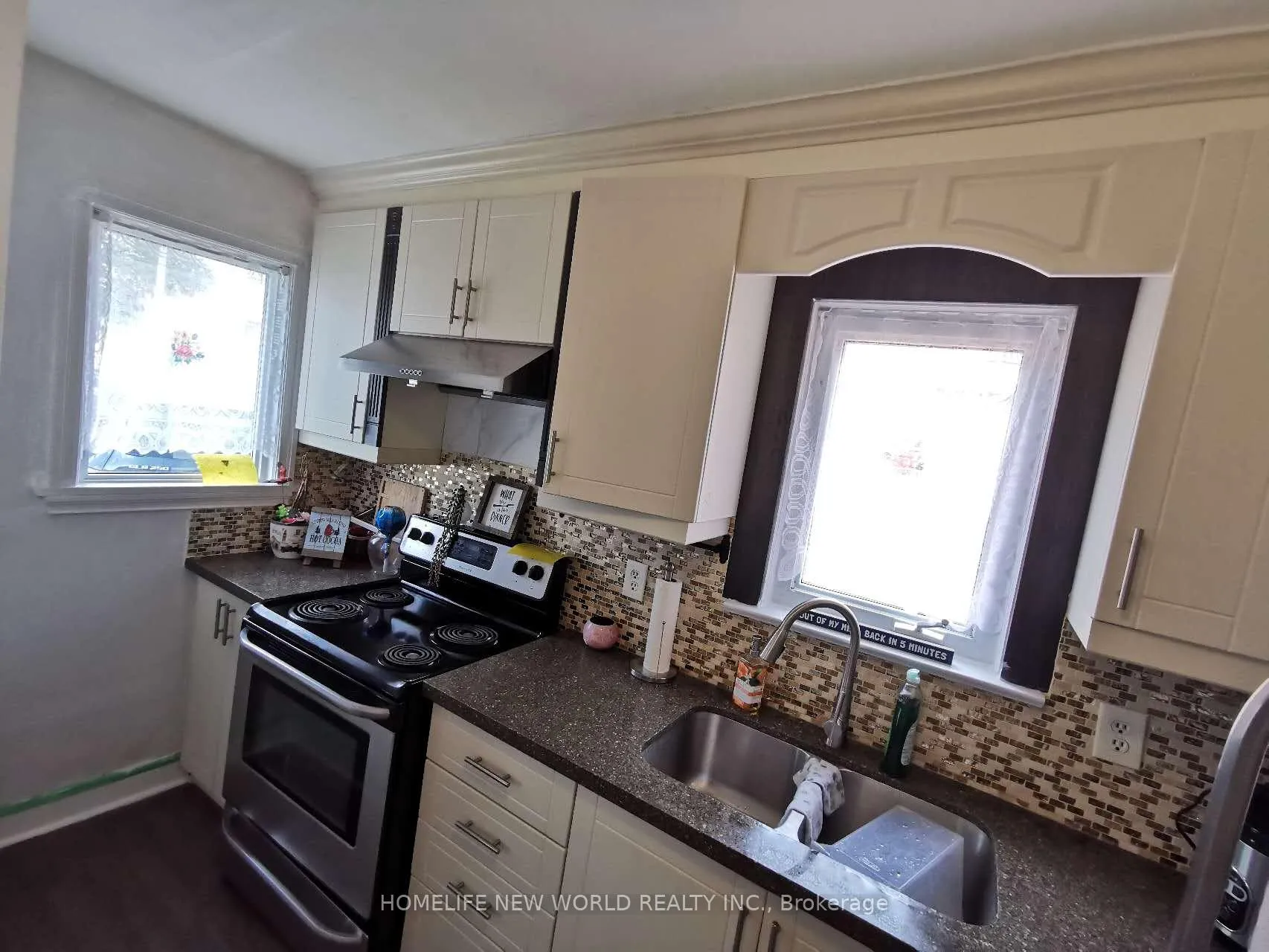 Photo 4 of 2421 Gerrard Street E, Toronto, East End-Danforth — HOMEH