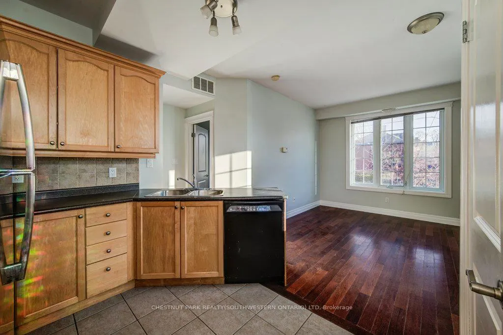 Photo 4 of Unit 201, 555 King Street E, Kitchener, King East — HOMEH