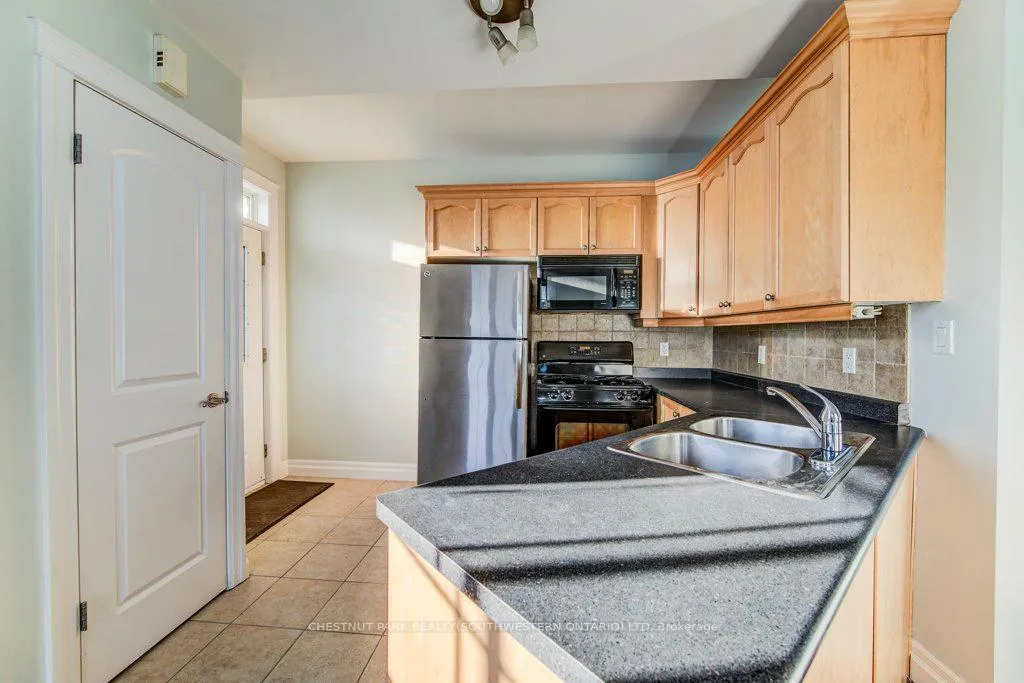 Photo 5 of Unit 201, 555 King Street E, Kitchener, King East — HOMEH