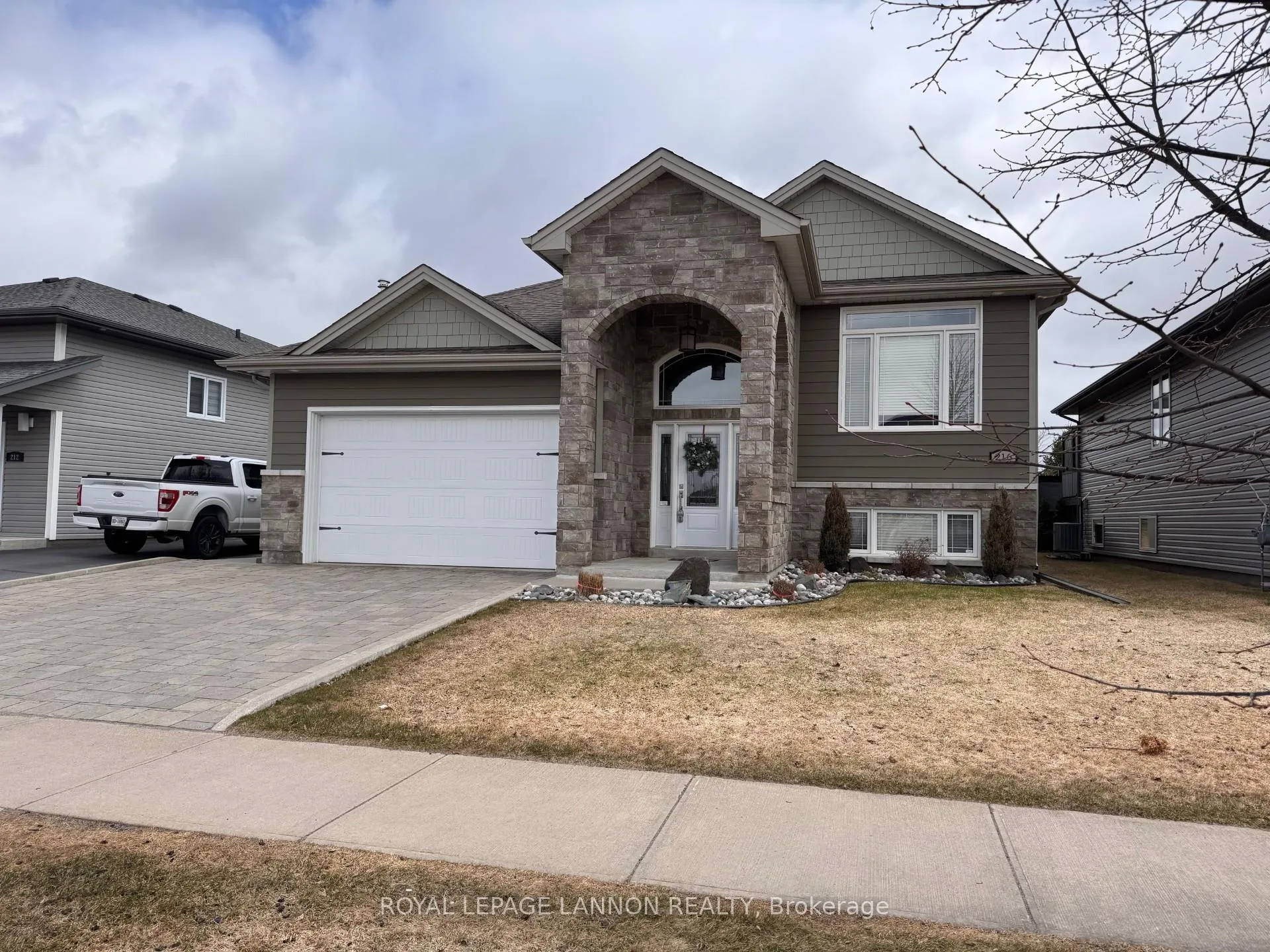 Front of 216 Cougar Crescent