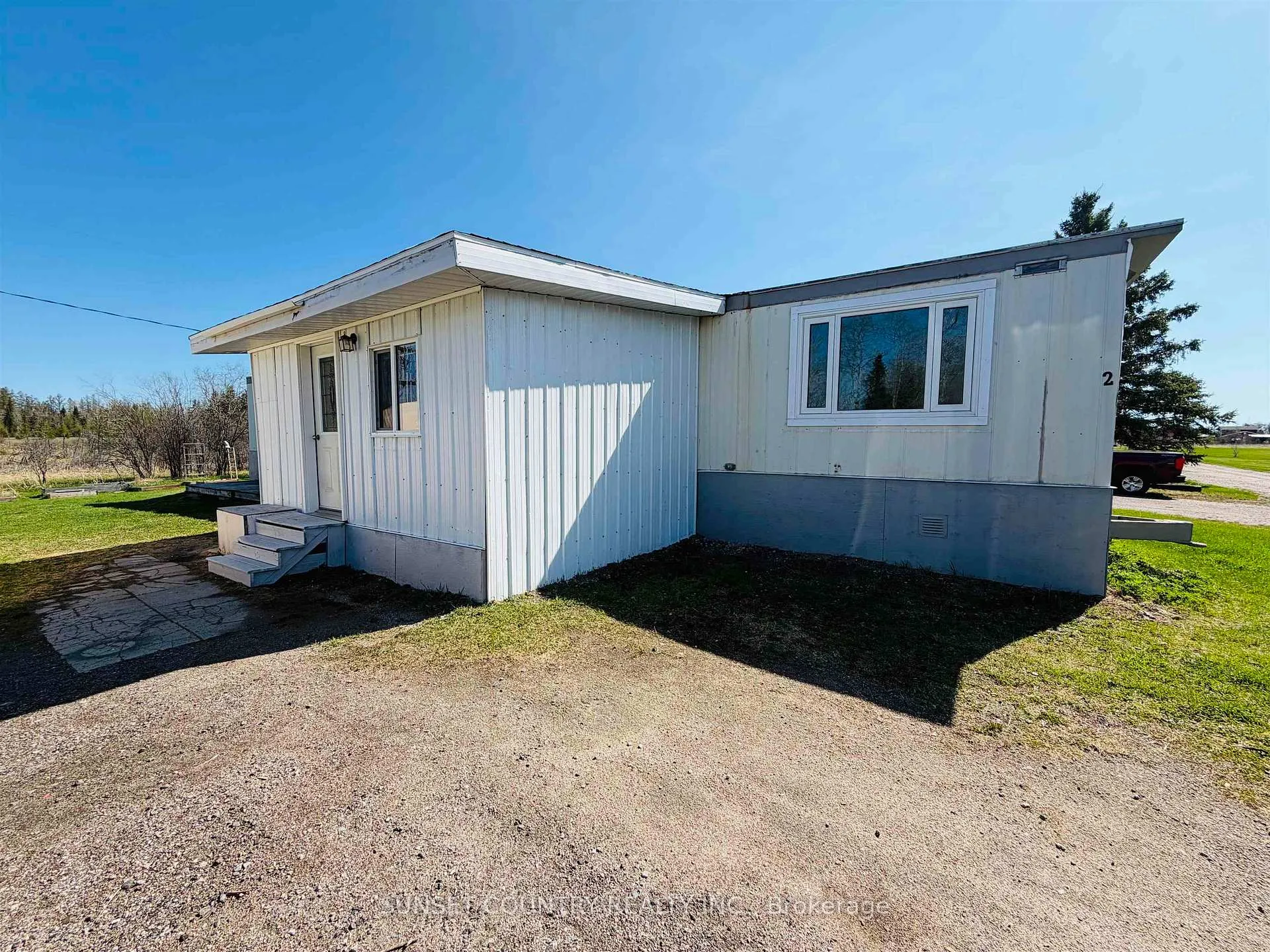 Photo 2 of Unit 2, 27 Minnitaki Road N, Machin — HOMEH
