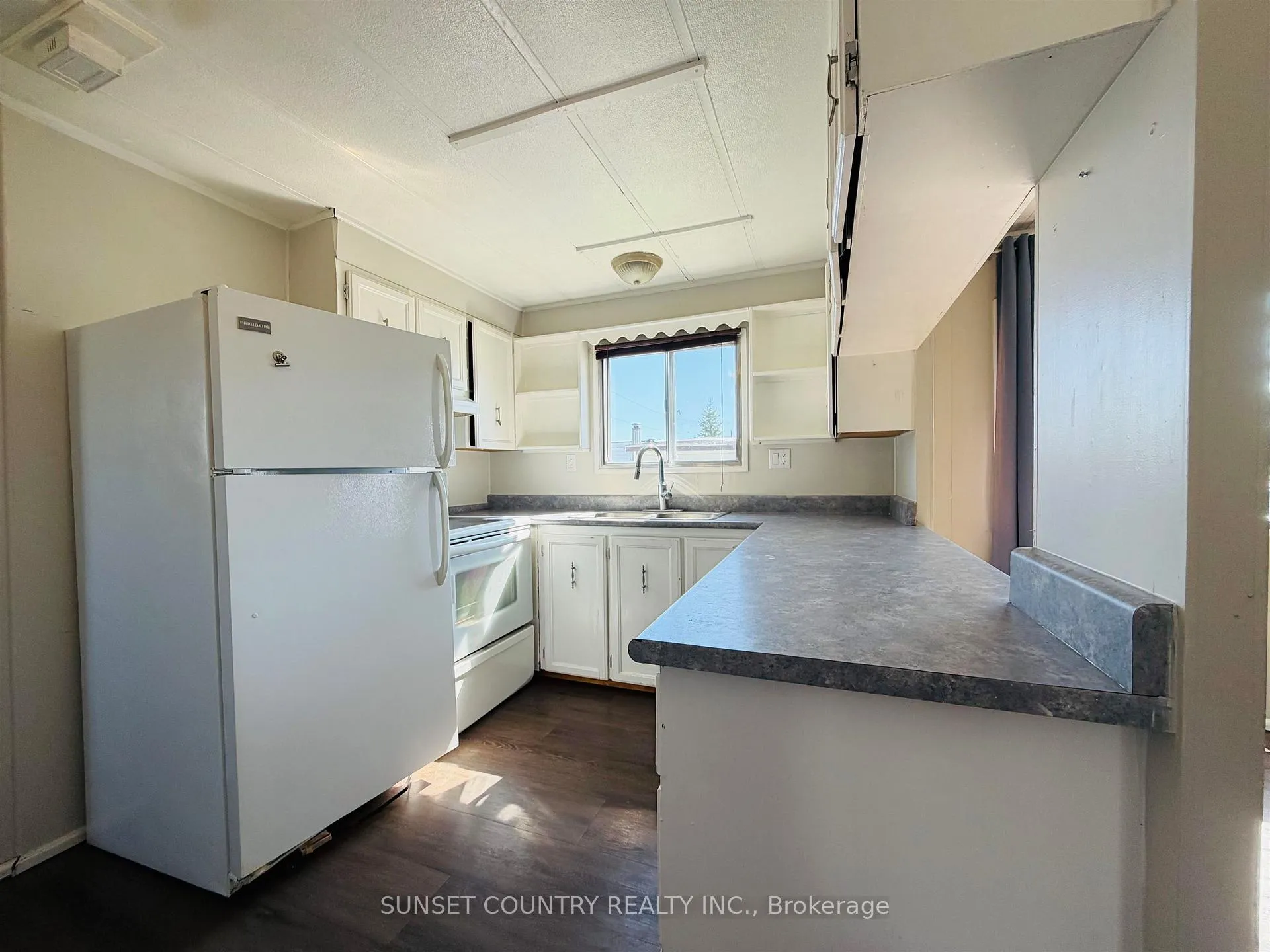 Photo 10 of Unit 2, 27 Minnitaki Road N, Machin — HOMEH