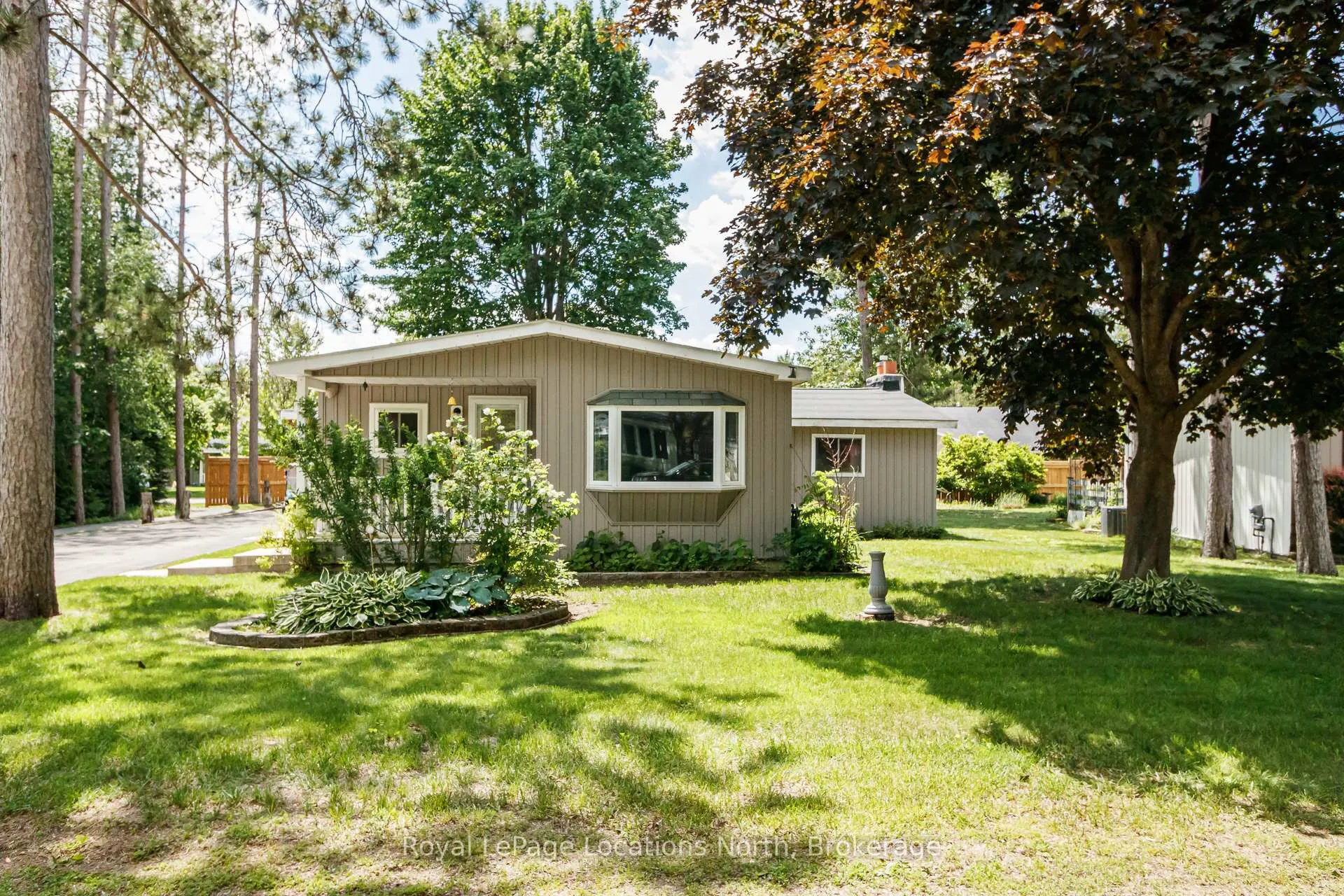 Photo 1 of Unit 5, 5 Golf Avenue SW, Wasaga Beach — HOMEH