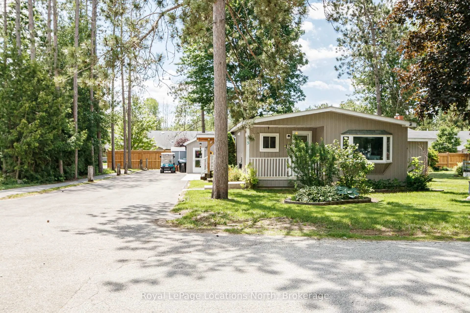 Photo 2 of Unit 5, 5 Golf Avenue SW, Wasaga Beach — HOMEH