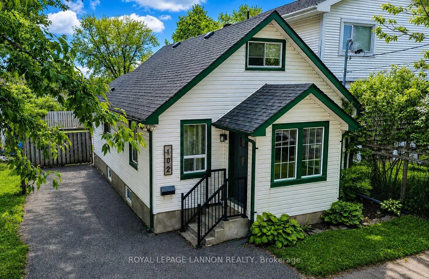 Front of 102 Kenogami Avenue S