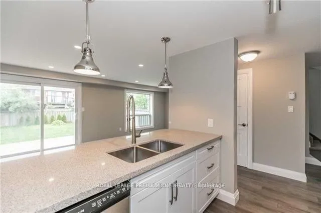 Photo 4 of 80 Wessenger Drive, Barrie, Holly — HOMEH