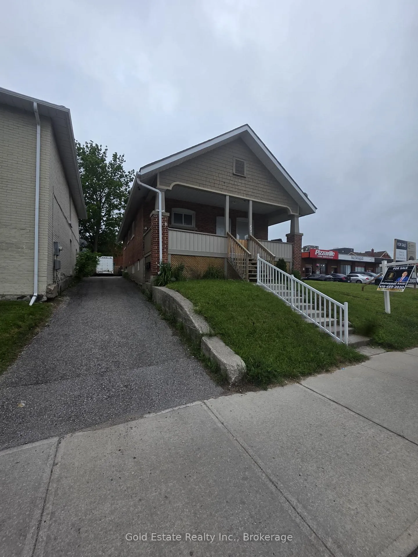 Photo 2 of 65 Front Street S, Orillia — HOMEH