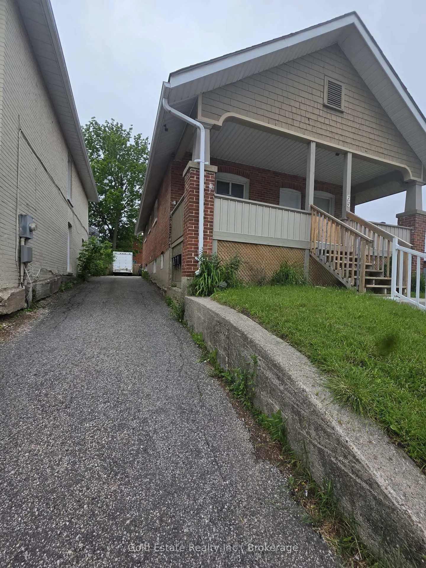 Photo 3 of 65 Front Street S, Orillia — HOMEH