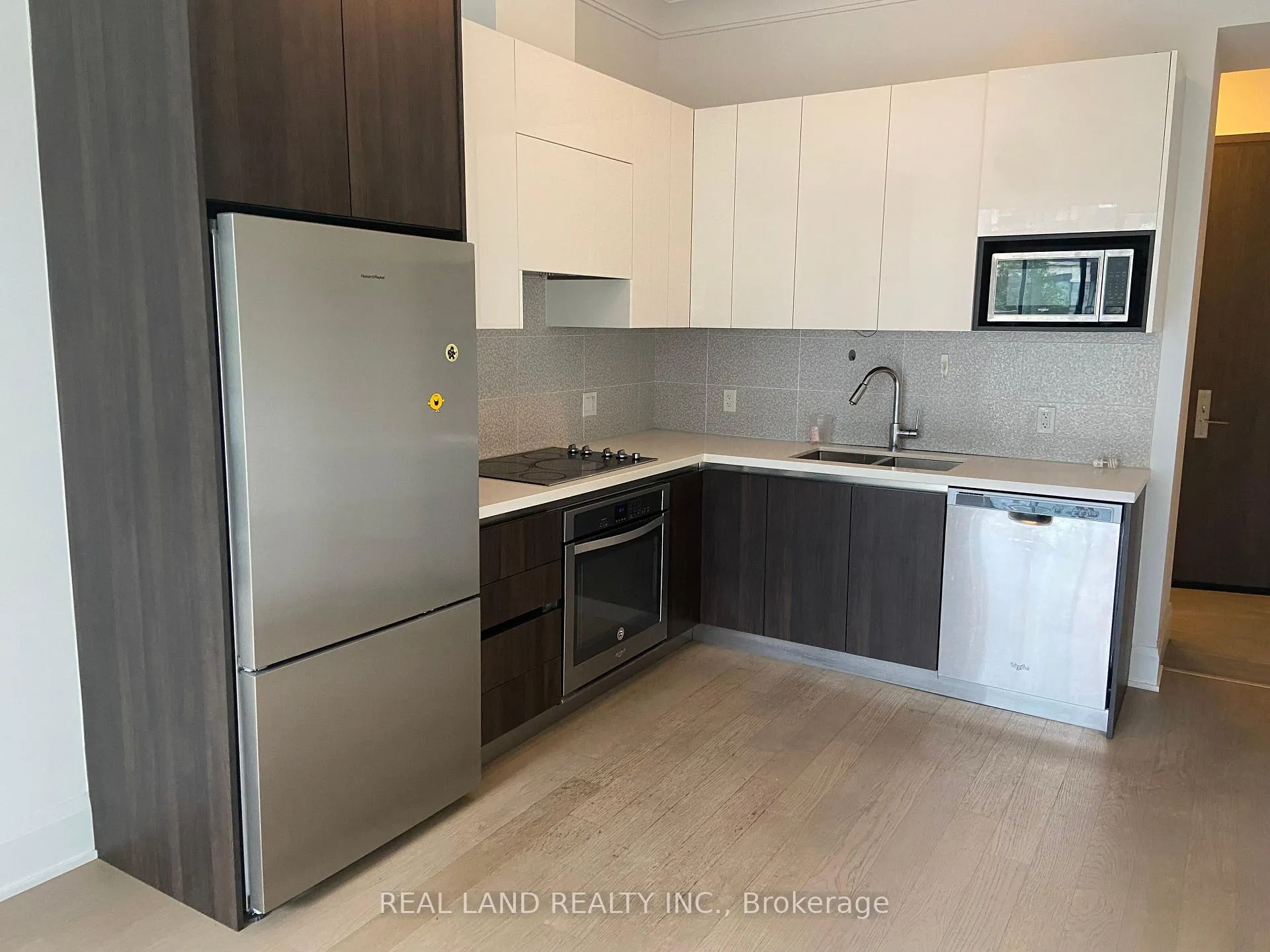 Photo 5 of Unit 203, 25 Water Walk Drive, Markham, Unionville — HOMEH