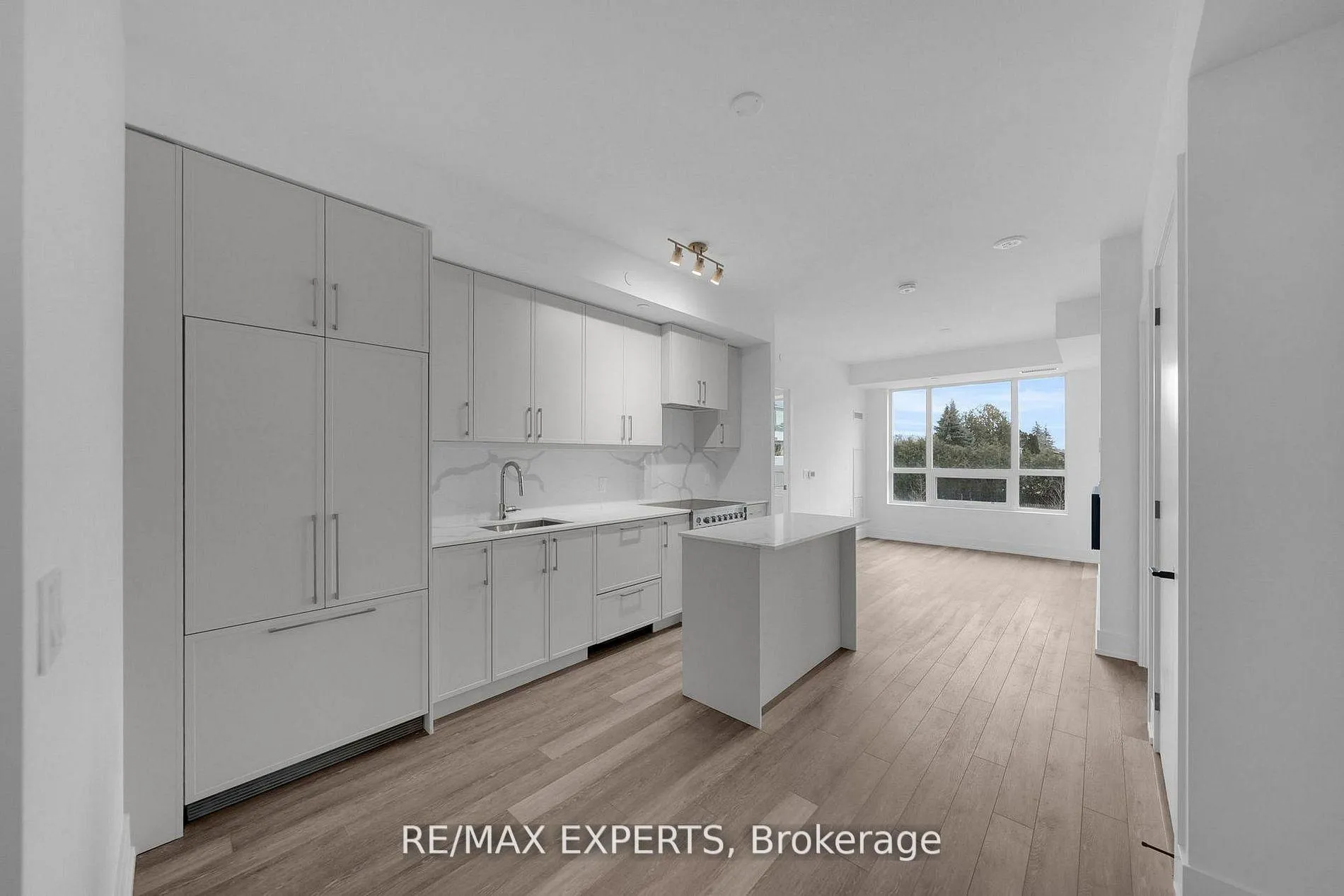 Photo 3 of Unit 203, 2075 King Road, King, King City — HOMEH