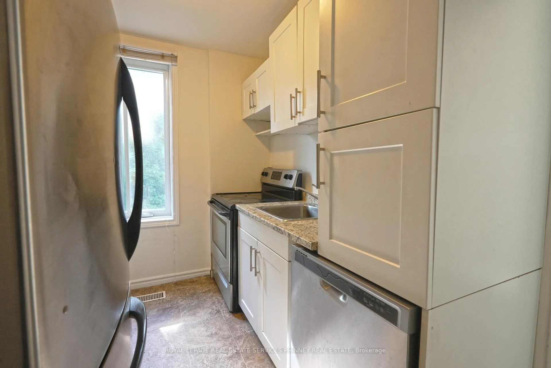 Photo 5 of Unit 2, 65 Liberty Street, Hamilton, Corktown — HOMEH