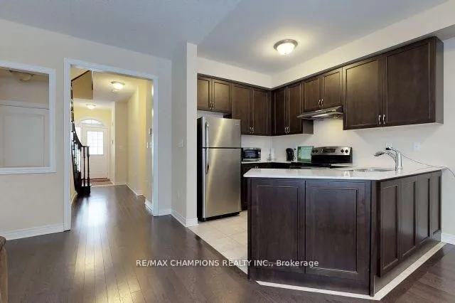 Photo 3 of 64 Pennycross Crescent, Brampton, Northwest Brampton — HOMEH