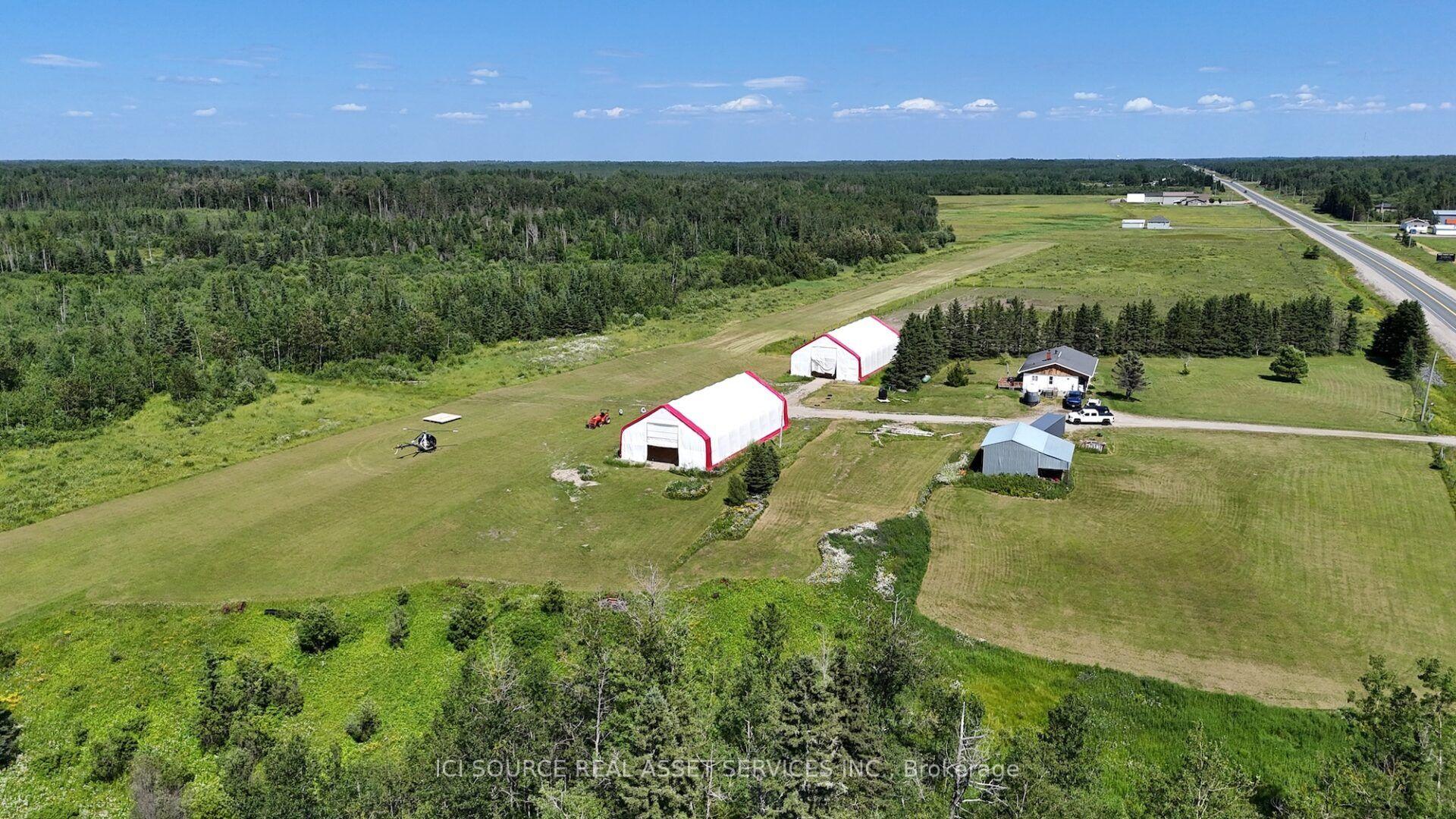 Photo 3 of 1527 Highway 11 W, Cochrane — HOMEH