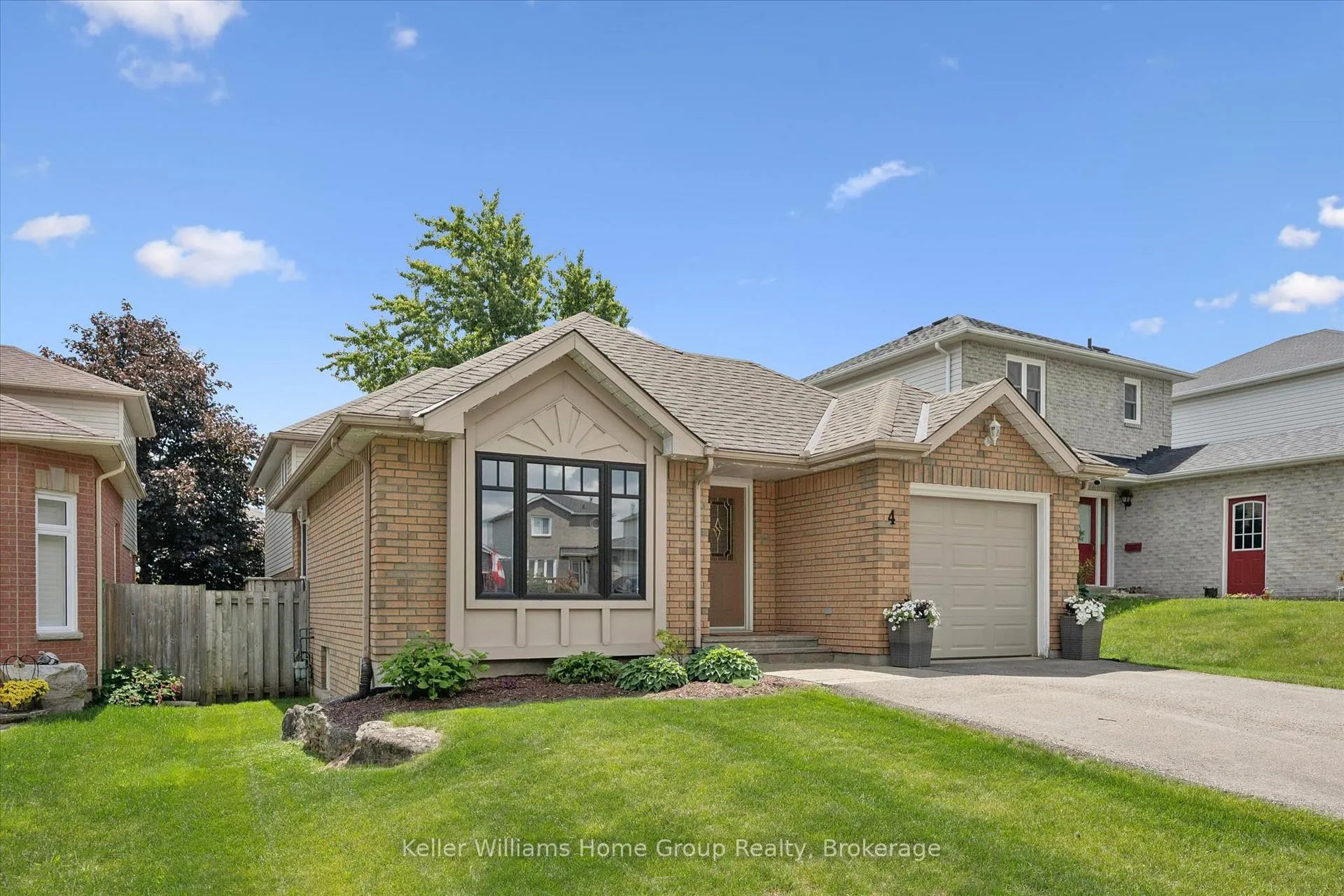 Photo 2 of 4 Eastview Crescent, Orangeville — HOMEH