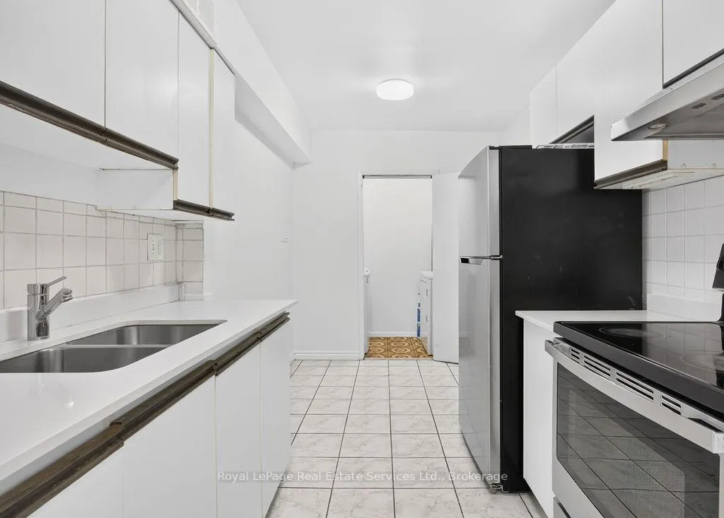 Photo 6 of Unit 1406, 390 Dixon Road, Etobicoke, Kingsview Village-The Westway — HOMEH
