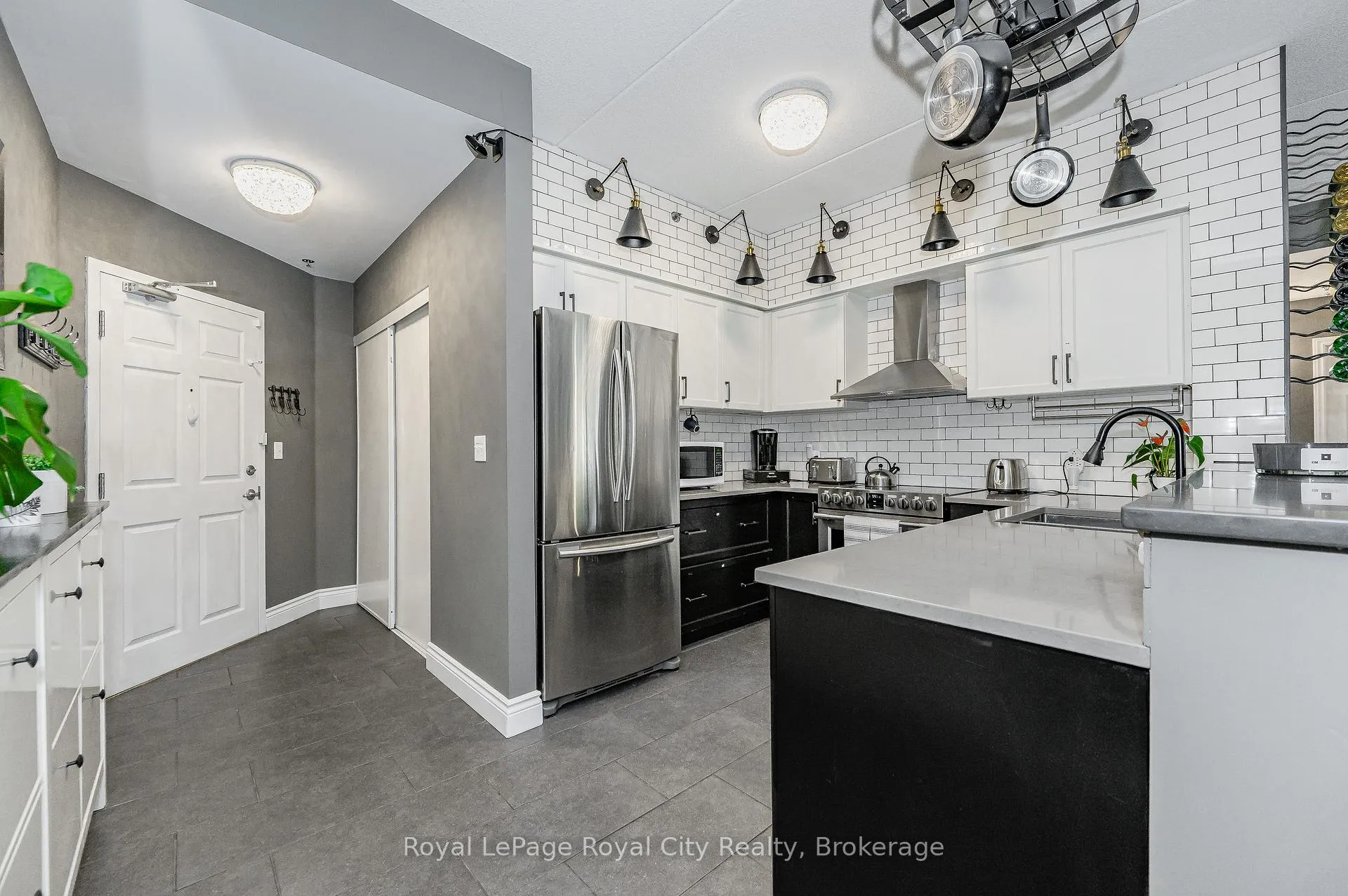 Photo 2 of Unit 102, 308 Watson Parkway N, Guelph, Grange Road — HOMEH