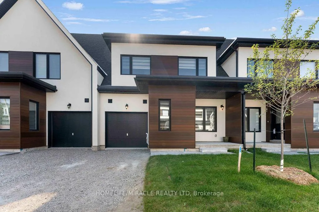 Photo 3 of 6 Rice Lane, Orillia — HOMEH