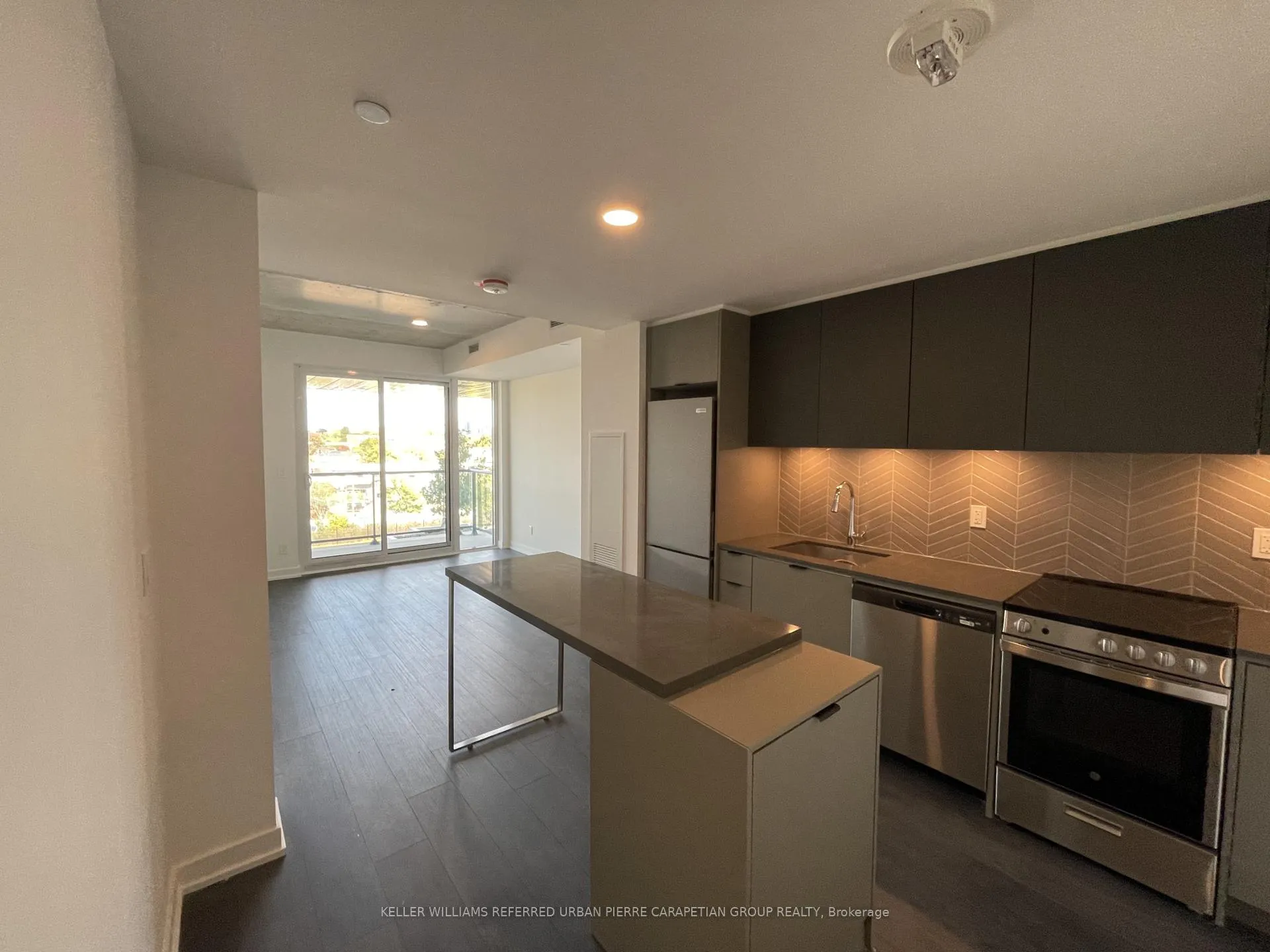 Photo 4 of Unit 413, 57 Brock Avenue, Toronto, Roncesvalles — HOMEH