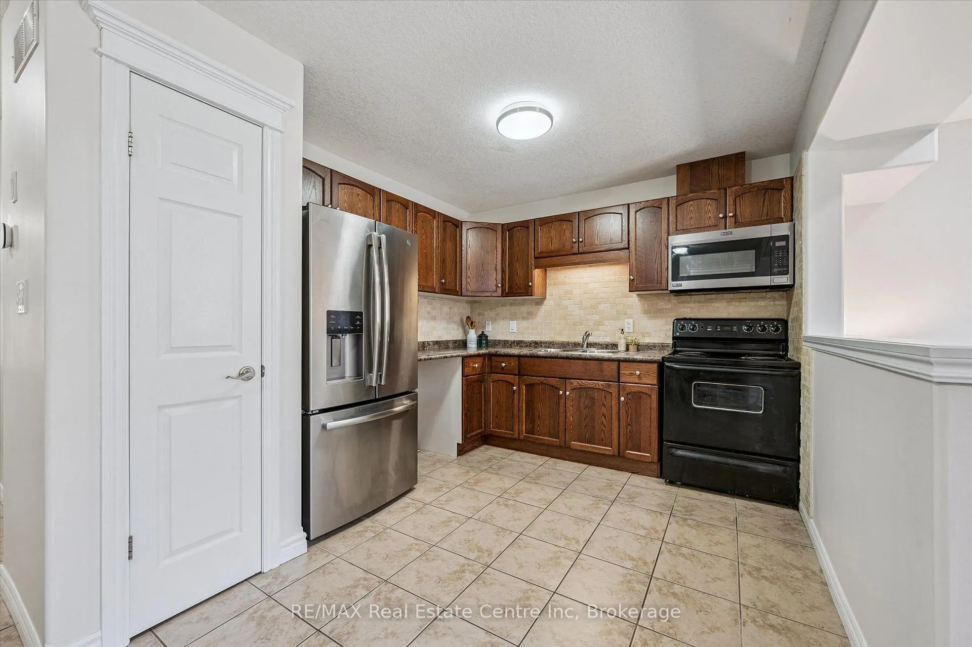 Photo 3 of 93 Washburn Drive, Guelph, Grange Road — HOMEH