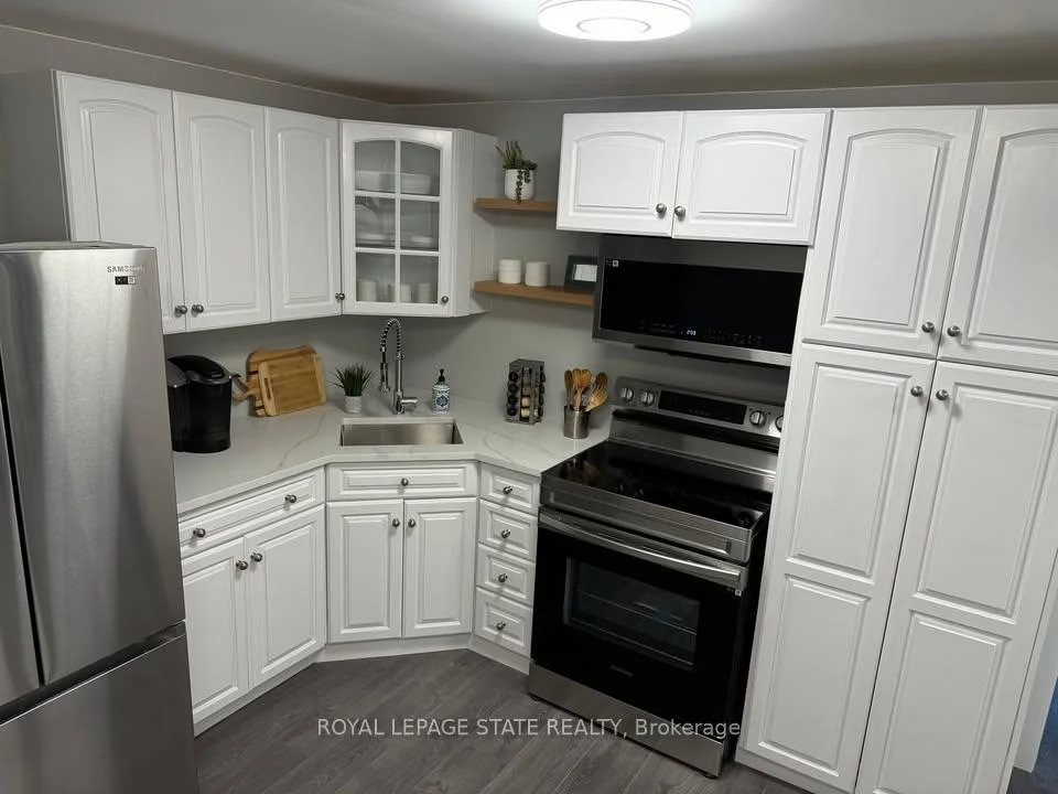 Photo 6 of Unit Basement, 348 Springbrook Avenue, Hamilton, Ancaster — HOMEH