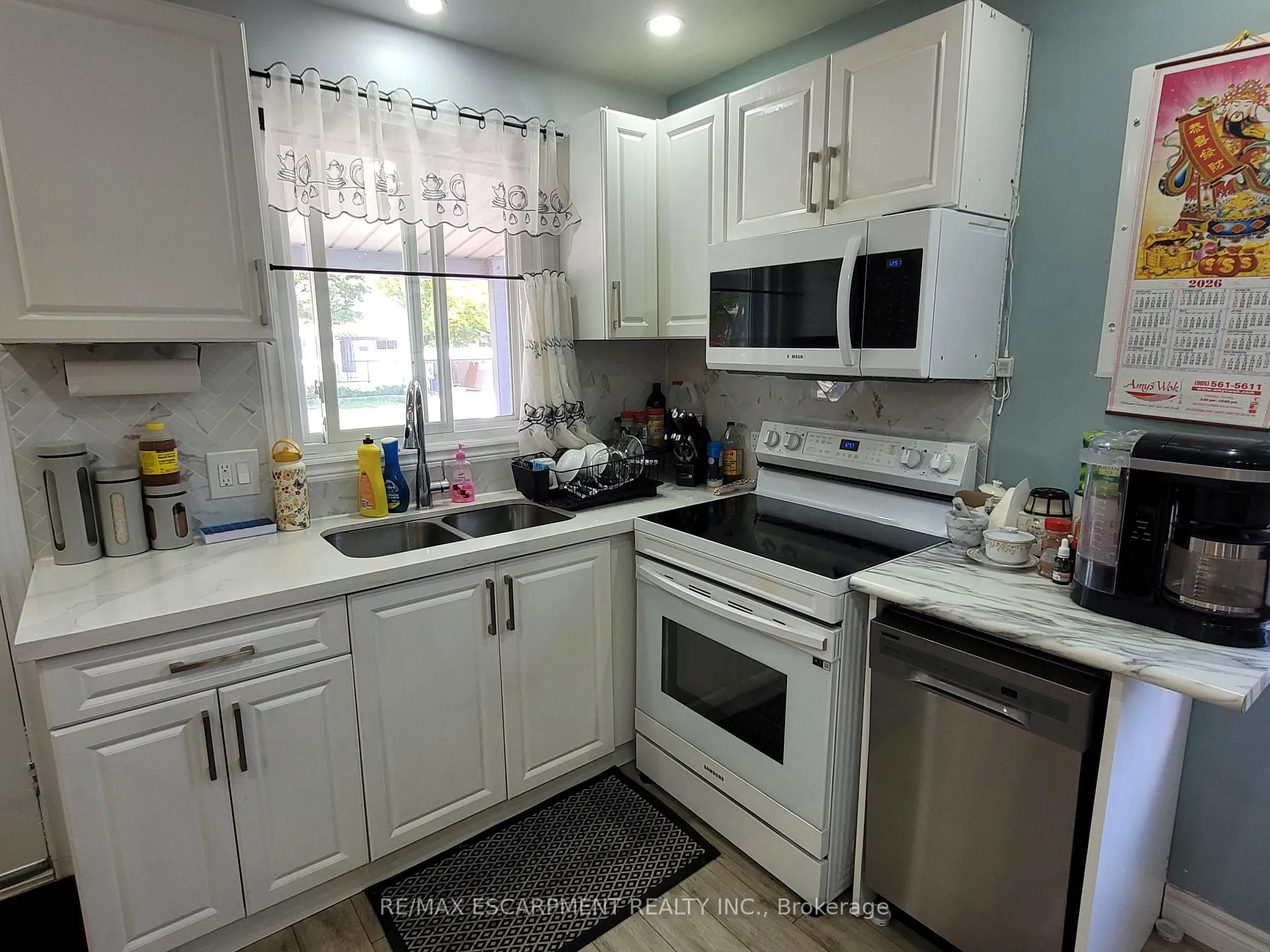 Photo 7 of 239 West 18TH Street, Hamilton, Buchanan — HOMEH