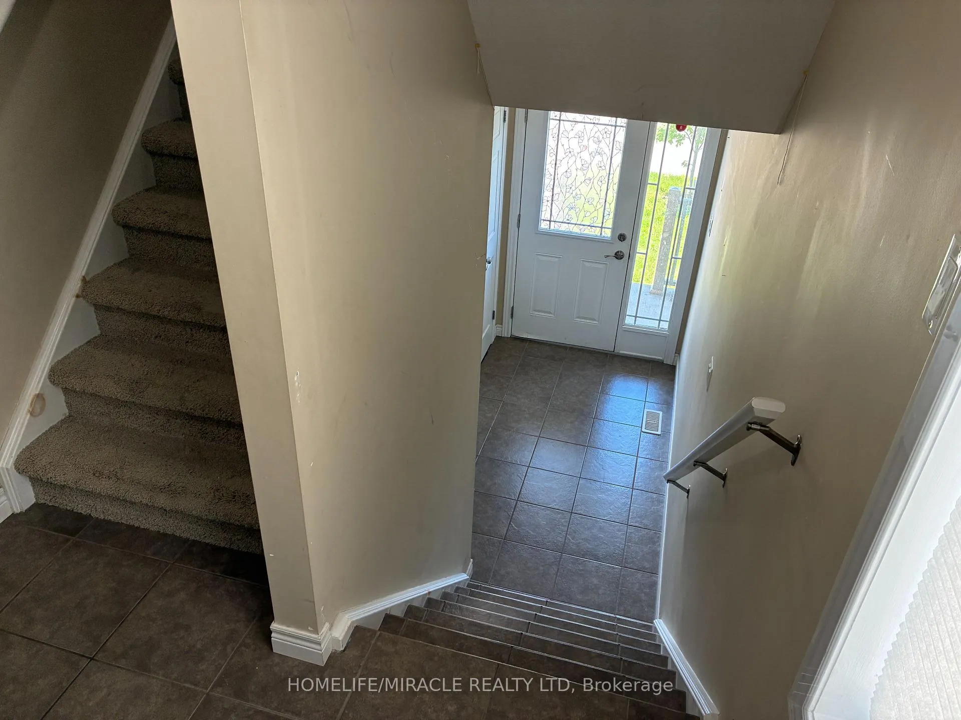 Photo 2 of 45 Oakes Crescent, Guelph, Grange Road — HOMEH