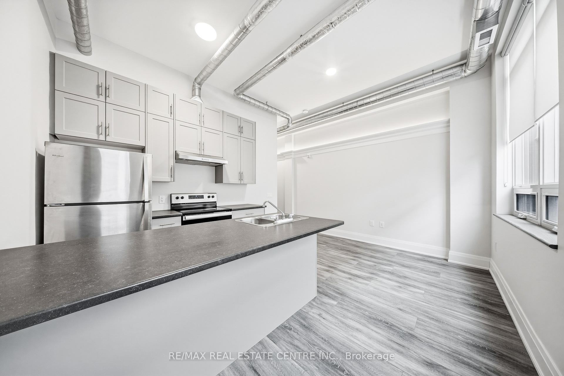 Photo 11 of Unit 206, 11 Queen Street, Brantford, Downtown Core — HOMEH