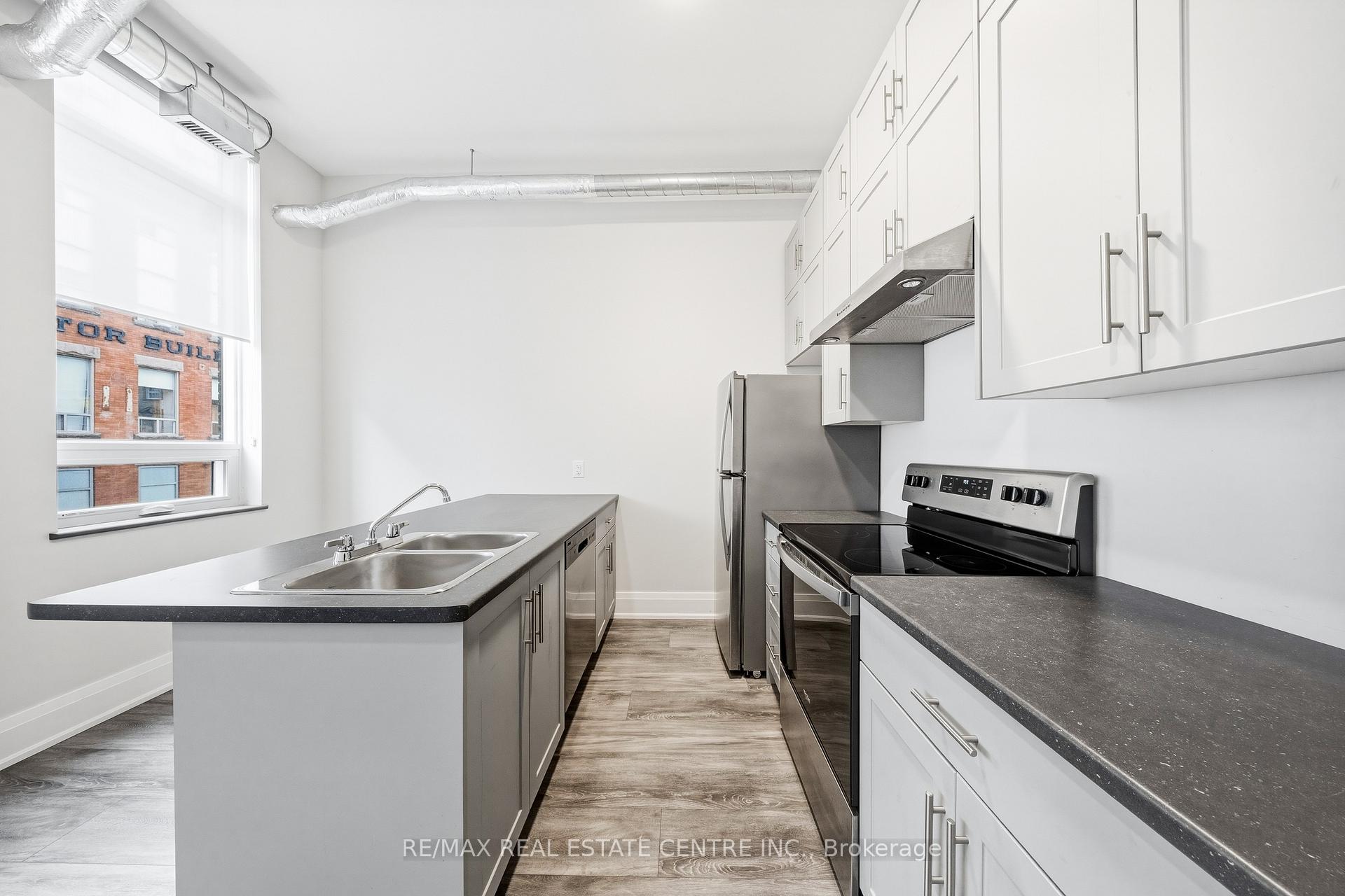 Photo 12 of Unit 206, 11 Queen Street, Brantford, Downtown Core — HOMEH