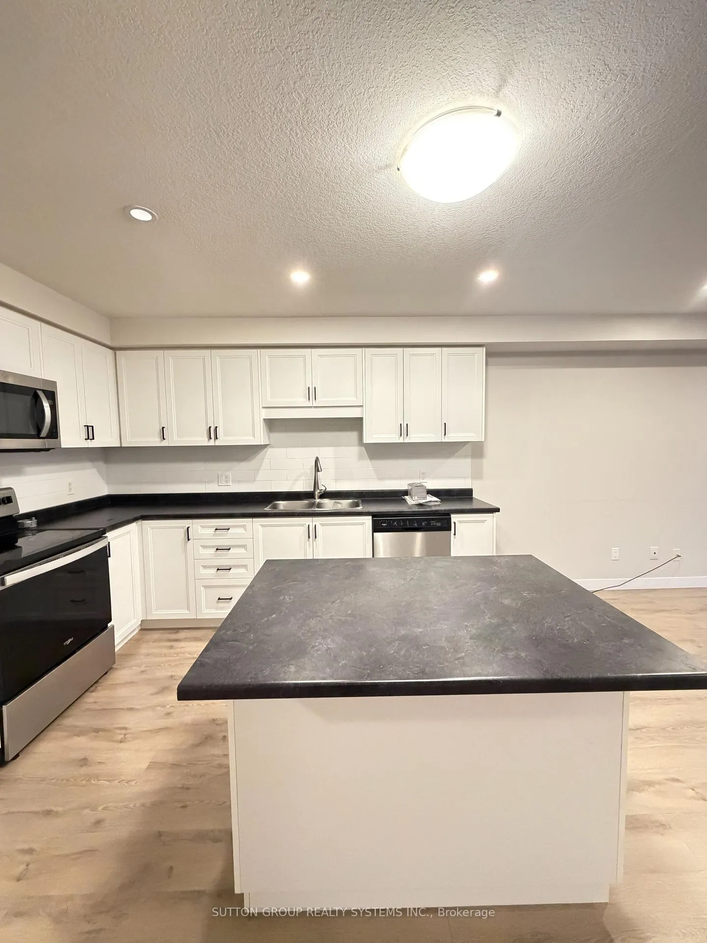 Photo 2 of Unit 4, 160 Stanley Street, Norfolk, Simcoe — HOMEH