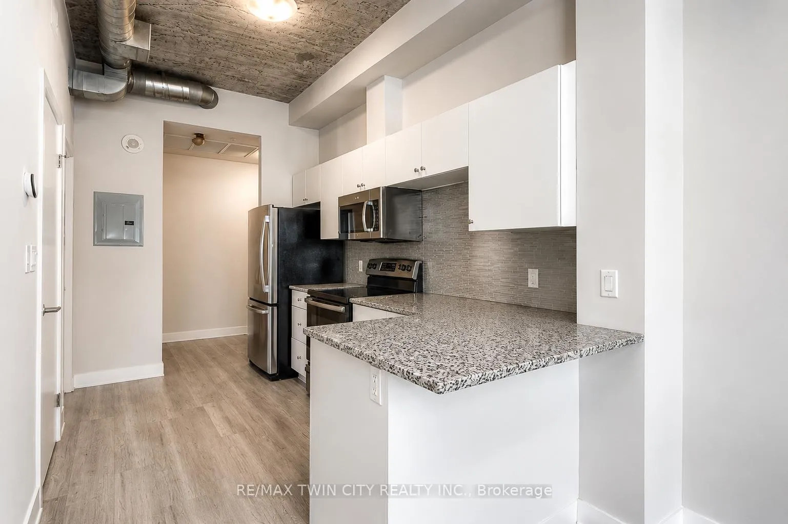 Photo 5 of Unit 409, 1 Victoria Street S, Kitchener, City Commercial Core — HOMEH