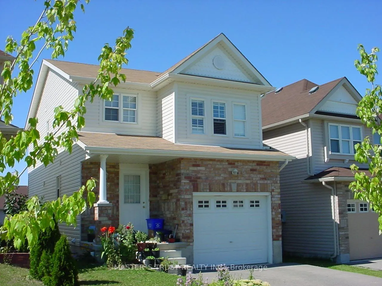 Front of 474 Trembling Aspen Avenue