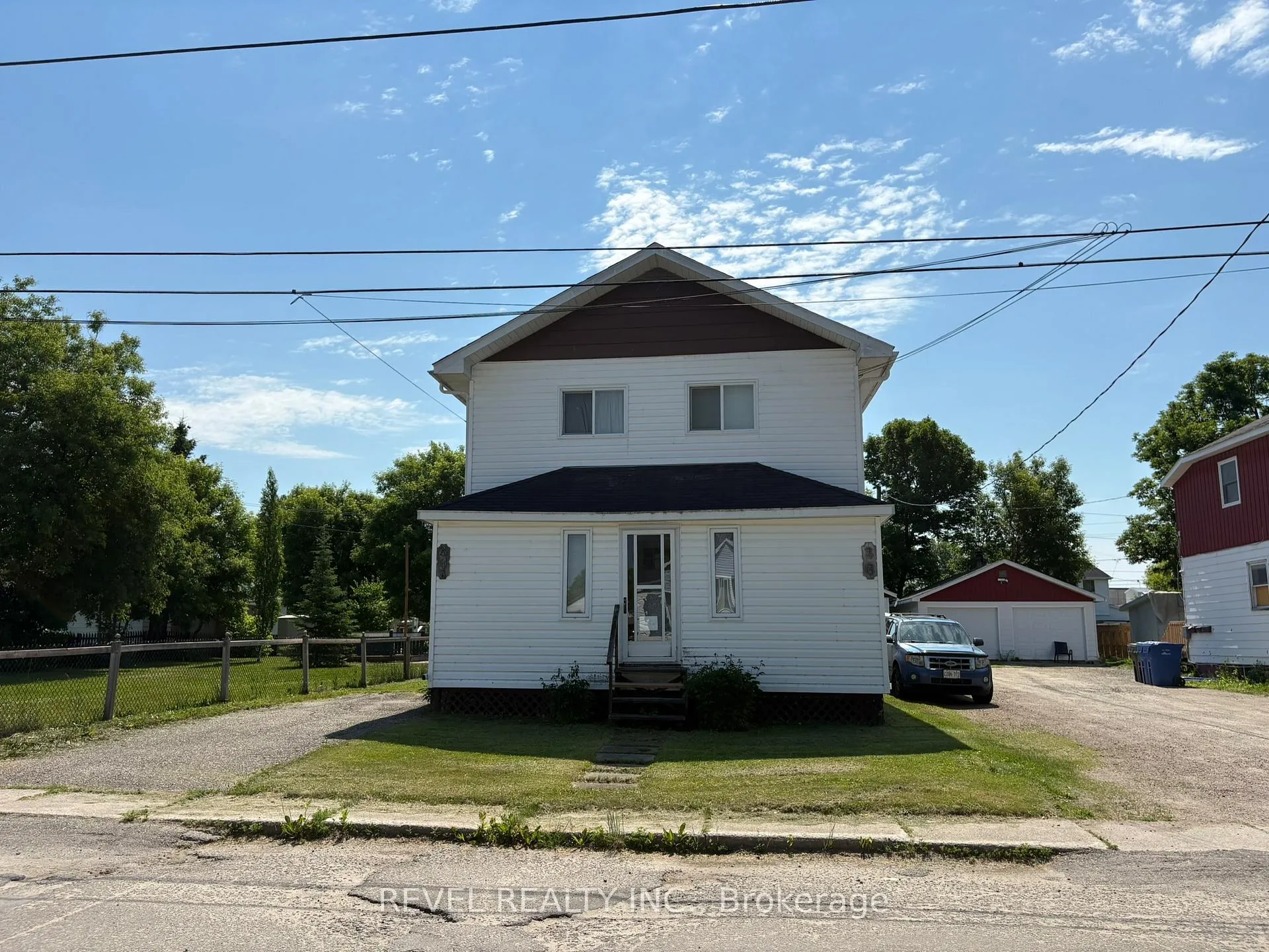 Photo 2 of 36 Stewart Avenue, Kapuskasing — HOMEH