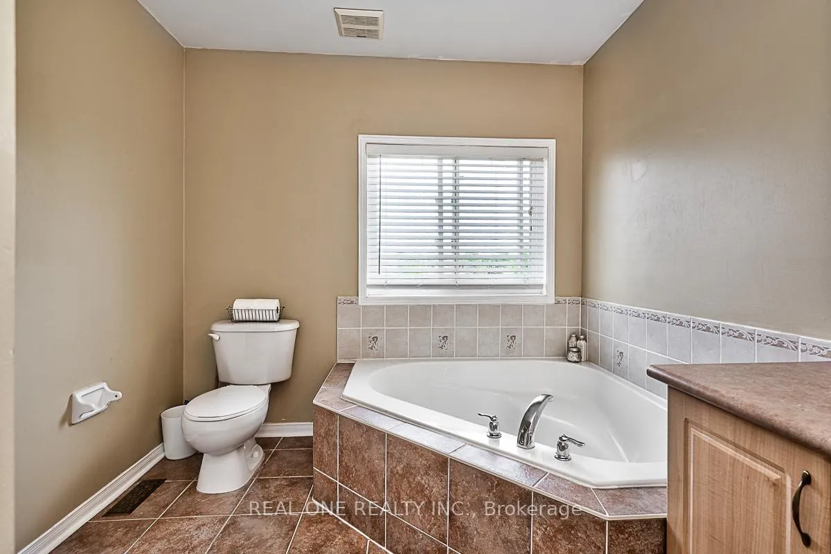 Photo 16 of 5881 Blue Spruce Avenue, Burlington, Orchard — HOMEH