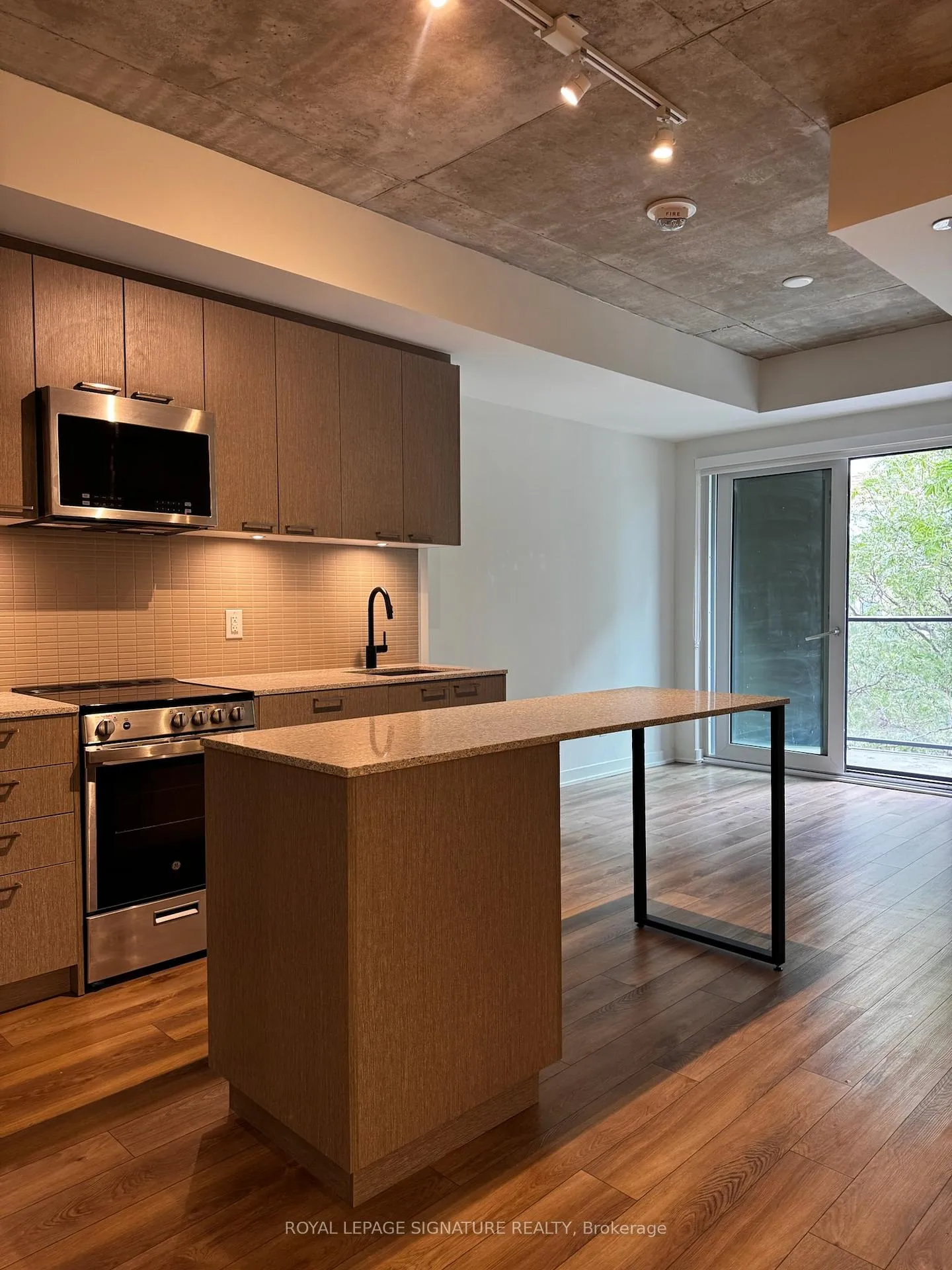 Photo 2 of Unit 307, 1808 St. Clair Avenue W, Toronto, Weston-Pellam Park — HOMEH