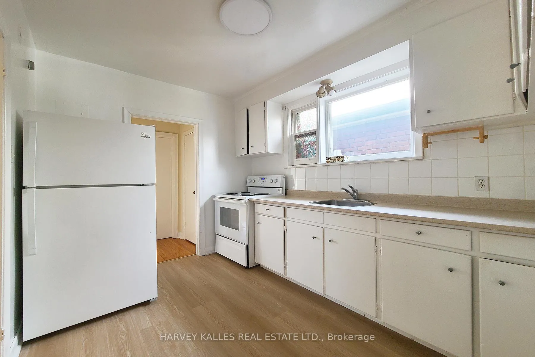 Photo 8 of 103 & 105 Gilmour Avenue, Toronto, Junction Area — HOMEH