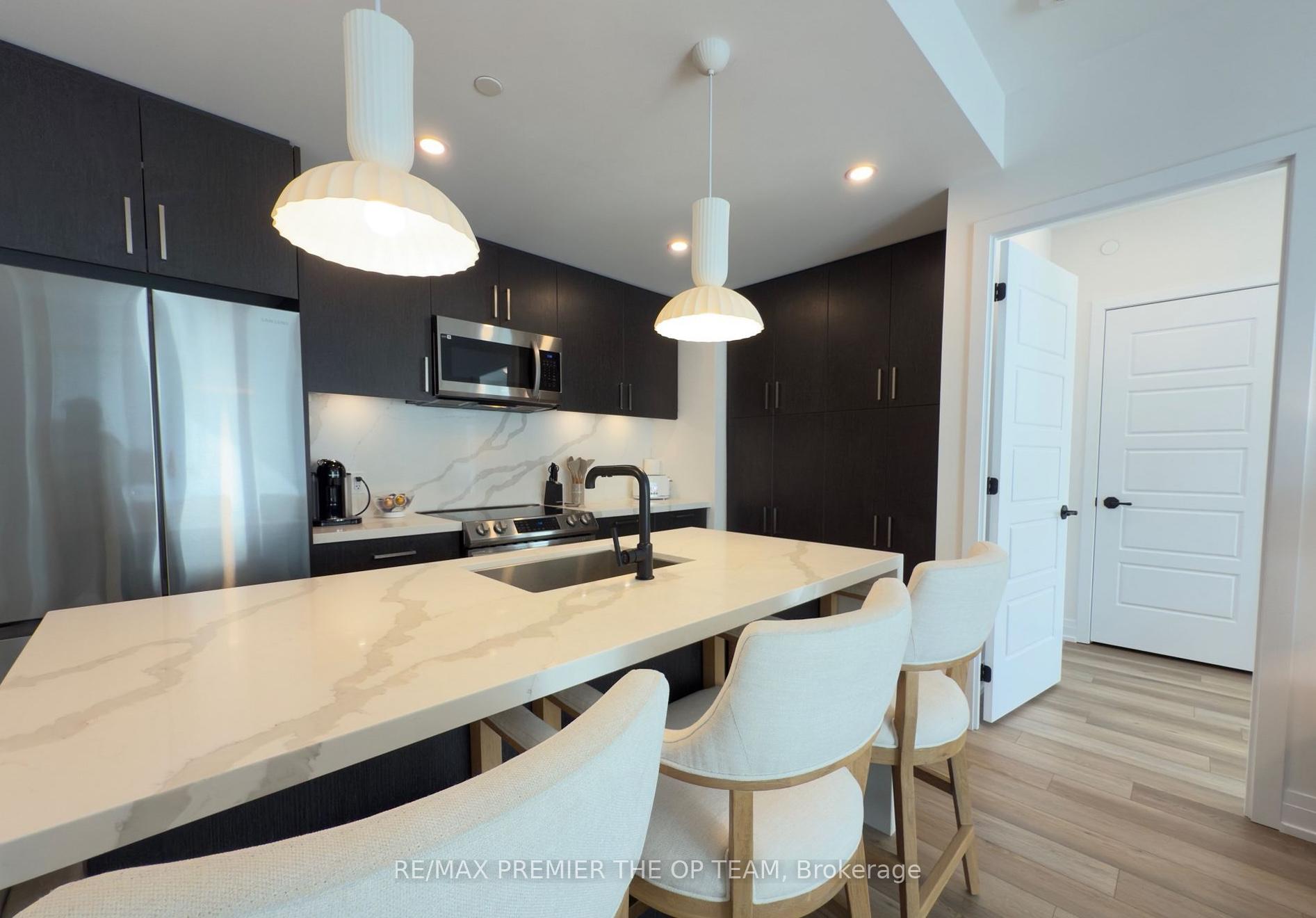 Photo 12 of Unit 321, 415 Sea Ray Avenue, Innisfil, Rural Innisfil — HOMEH