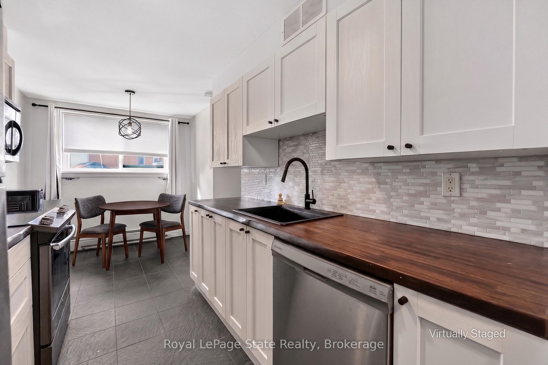 Photo 2 of Unit 1, 37 Conroy Crescent, Guelph, Dovercliffe Park/Old University — HOMEH