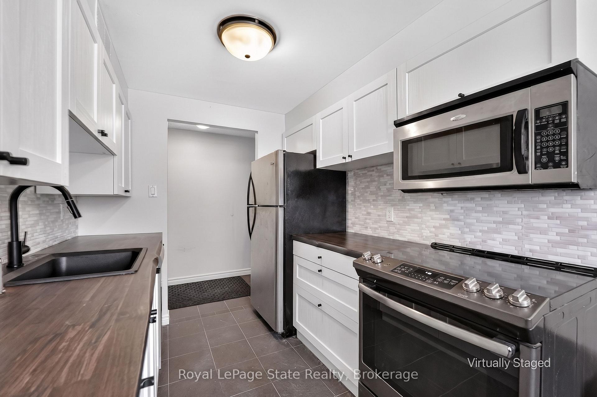 Photo 6 of Unit 1, 37 Conroy Crescent, Guelph, Dovercliffe Park/Old University — HOMEH