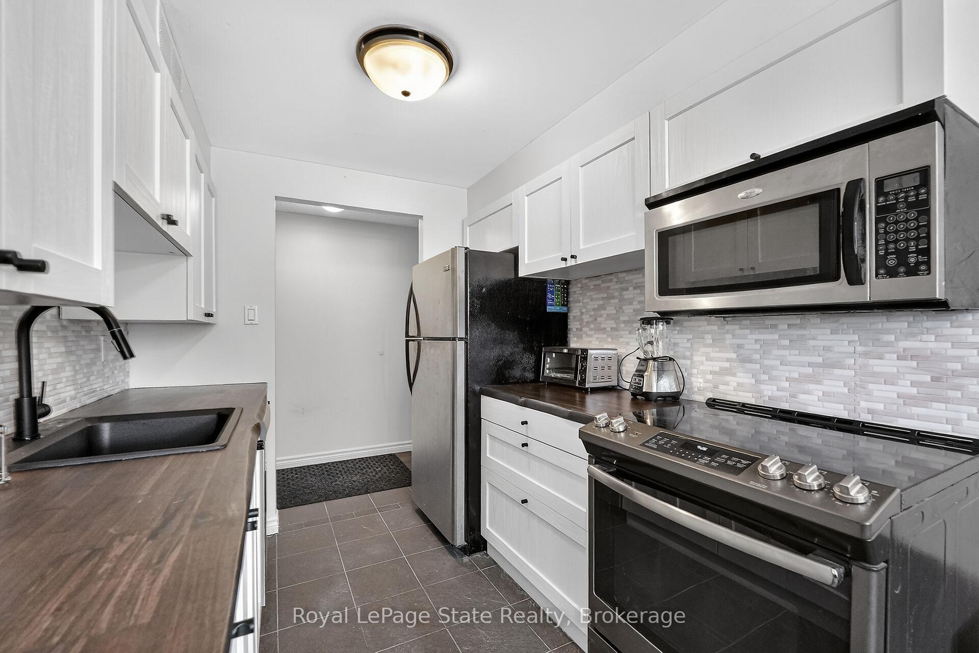 Photo 13 of Unit 1, 37 Conroy Crescent, Guelph, Dovercliffe Park/Old University — HOMEH