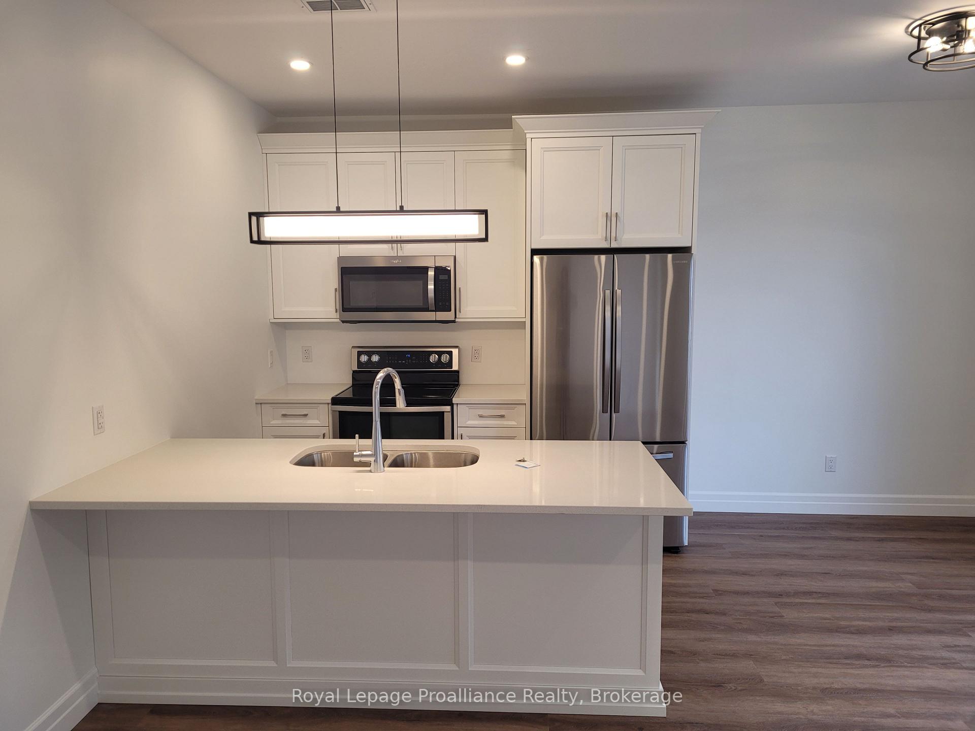 Photo 3 of Unit 4, 15 Bay Street, Quinte West, Trenton Ward — HOMEH