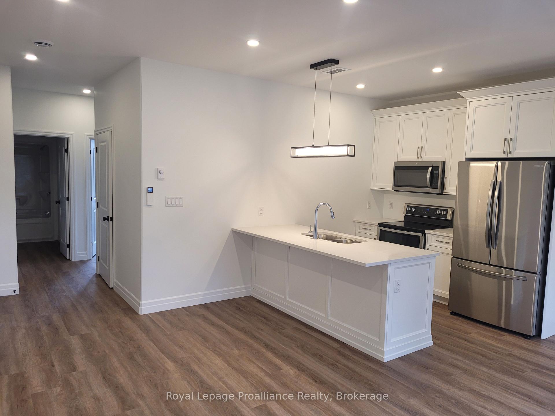 Photo 14 of Unit 4, 15 Bay Street, Quinte West, Trenton Ward — HOMEH