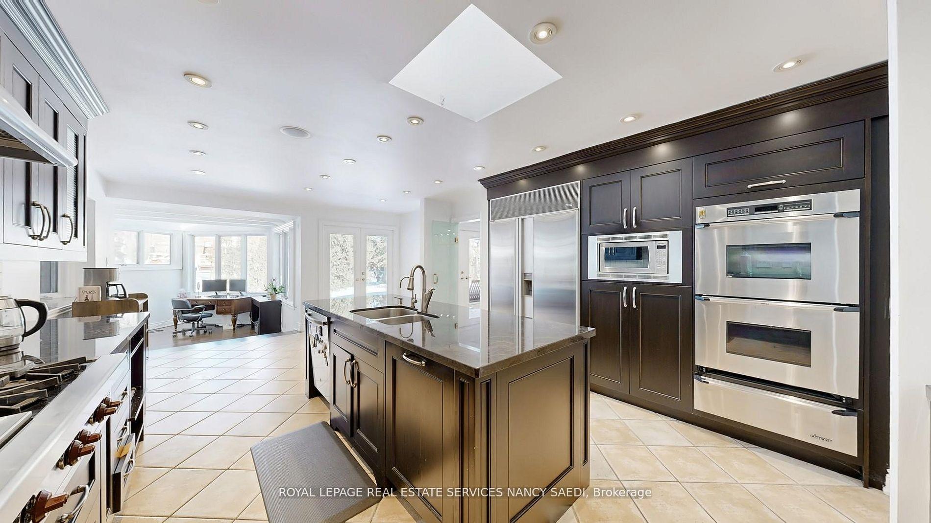 Photo 5 of 62 Wimpole Drive, North York, St. Andrew-Windfields — HOMEH