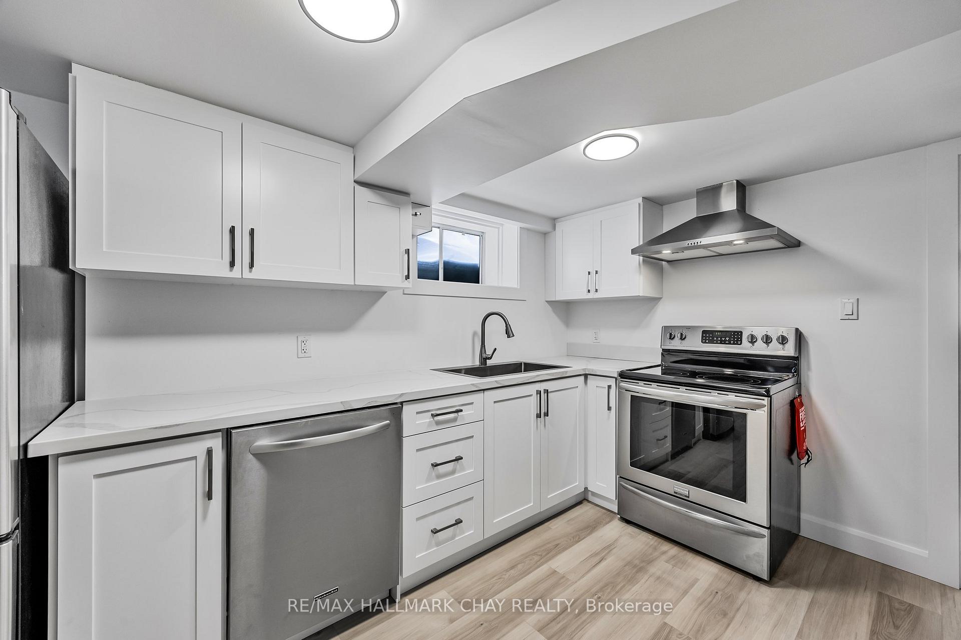 Photo 2 of Unit Lower, 204 Tupper Street W, New Tecumseth, Alliston — HOMEH