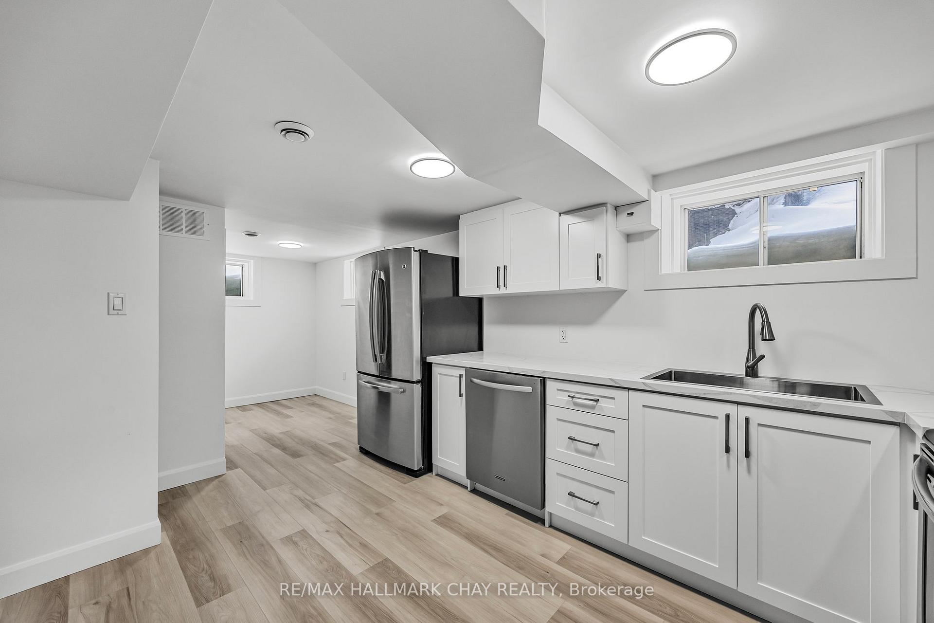 Photo 3 of Unit Lower, 204 Tupper Street W, New Tecumseth, Alliston — HOMEH
