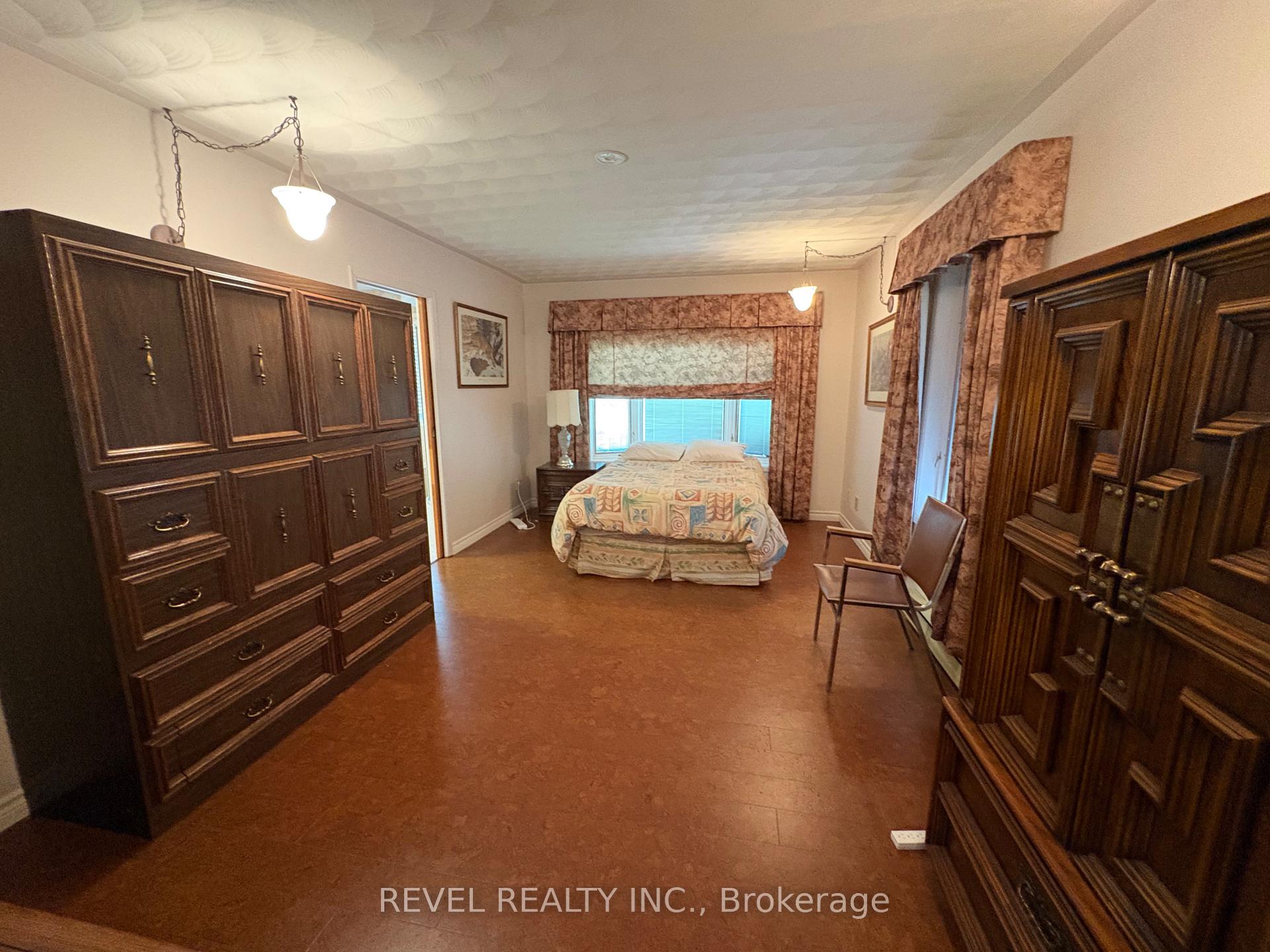 Photo 26 of 404 Thirteenth Avenue, Cochrane — HOMEH