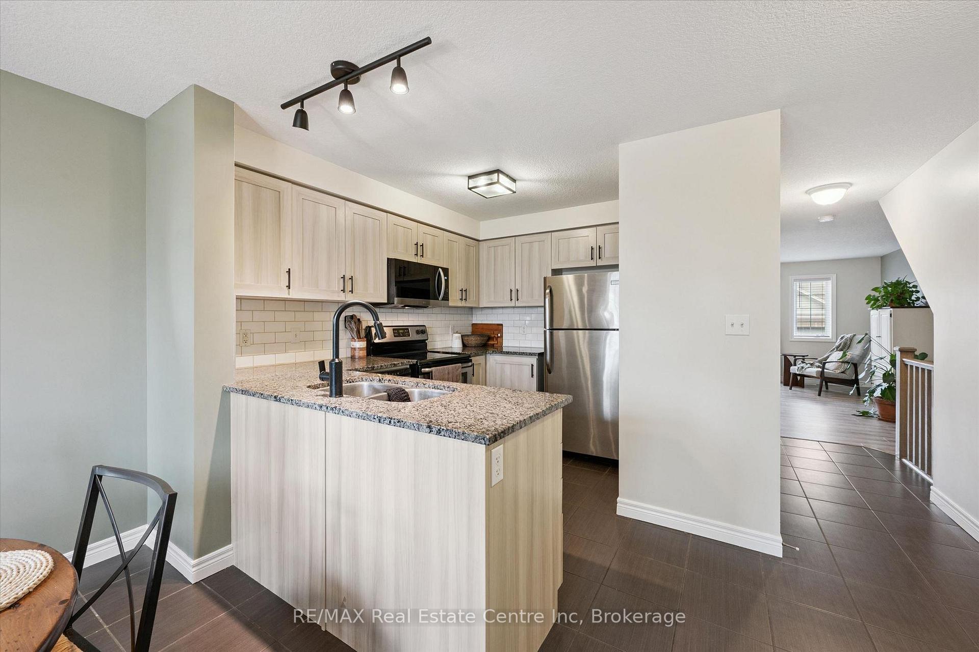 Photo 2 of Unit A, 634 Woodlawn Road, Guelph, Victoria North — HOMEH