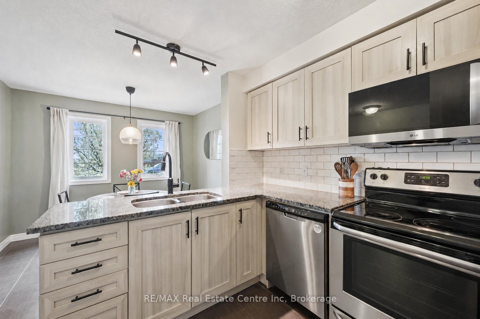 Photo 6 of Unit A, 634 Woodlawn Road, Guelph, Victoria North — HOMEH